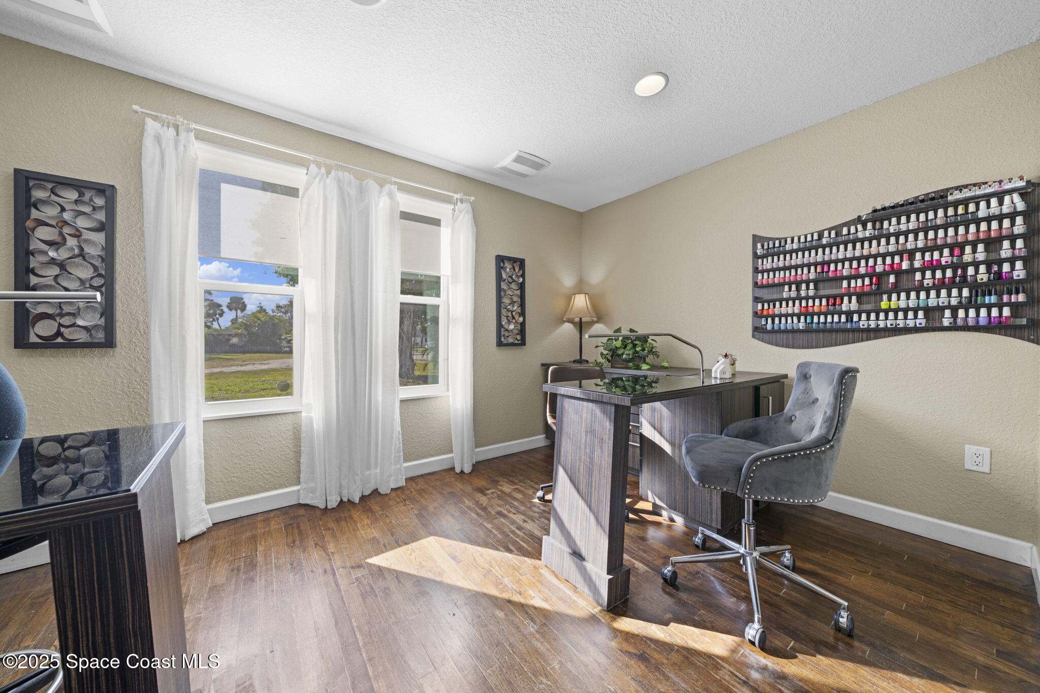 290 Parnell Street Merritt Island, FL 32953 - Photo 31 of 48 a living room with furniture and wooden floor