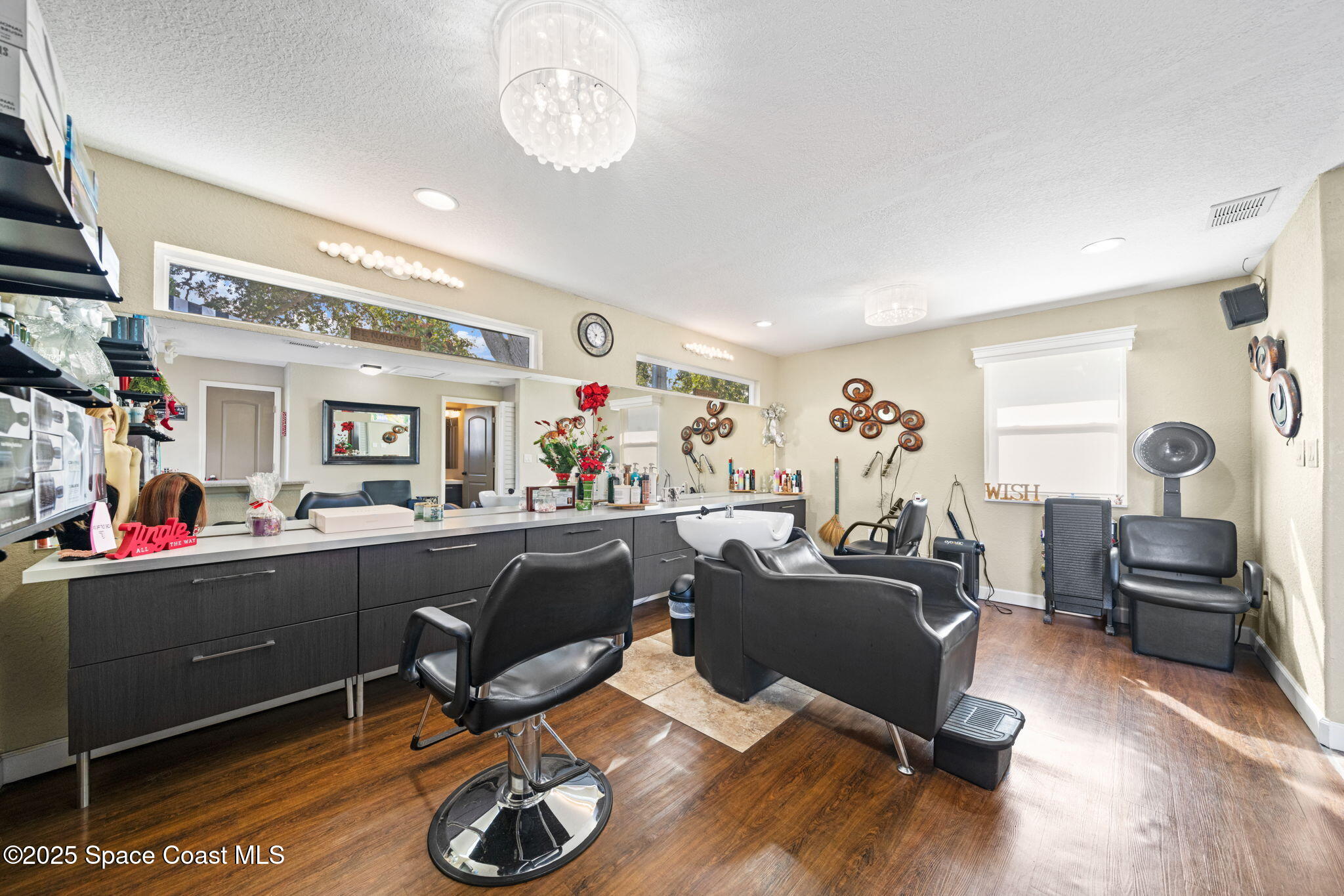 290 Parnell Street Merritt Island, FL 32953 - Photo 41 of 48 a view of a workspace with furniture and a window