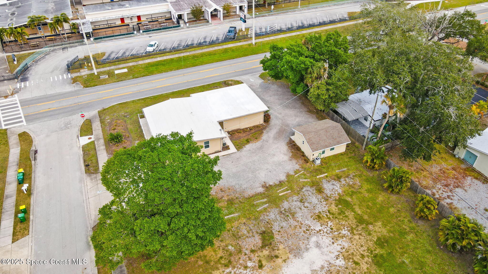 290 Parnell Street Merritt Island, FL 32953 - Photo 45 of 48 a view of a swimming pool with a yard