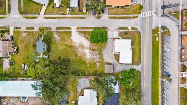 aerial view of a house with a swimming pool