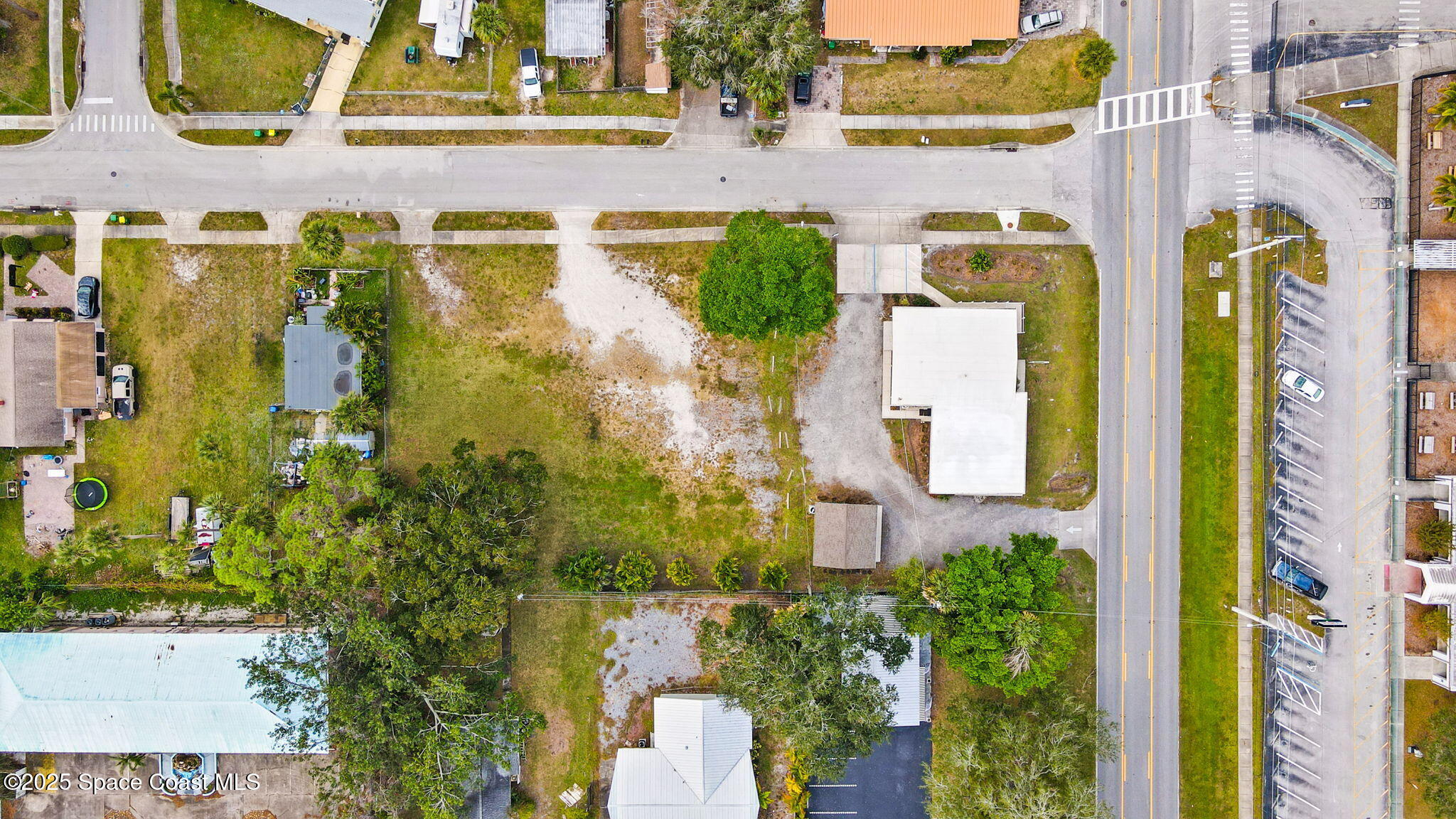 290 Parnell Street Merritt Island, FL 32953 - Photo 46 of 48 aerial view of a house with a swimming pool