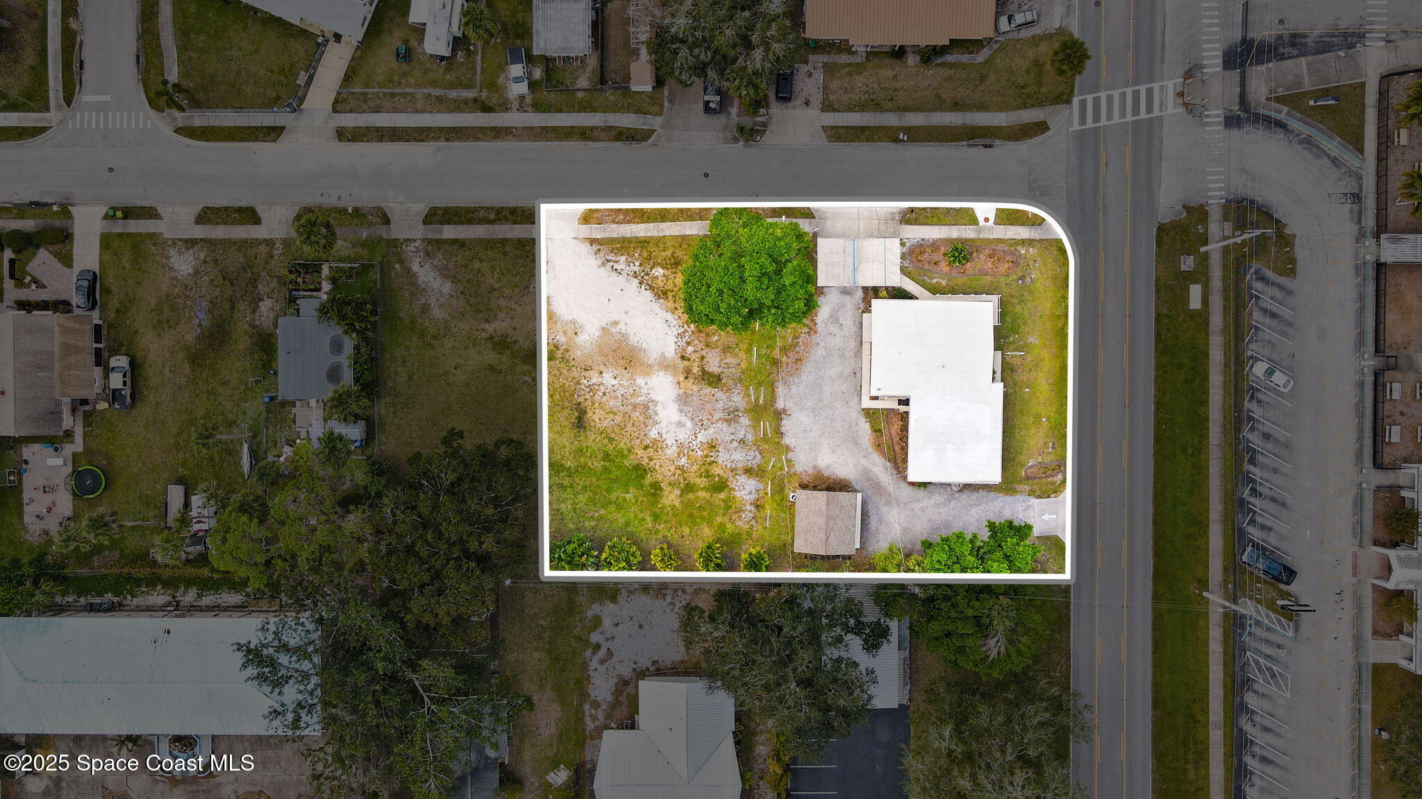 290 Parnell Street Merritt Island, FL 32953 - Photo 5 of 48 an aerial view of a house with a yard