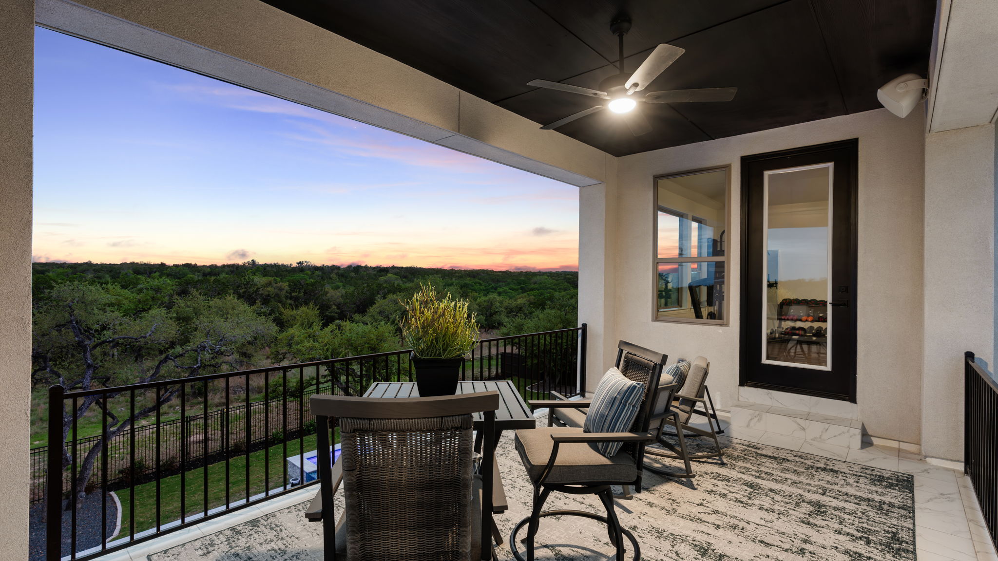 546 Bridge Water Loop Dripping Springs, TX 78620 - Photo 34 of 40 a view of a balcony with furniture