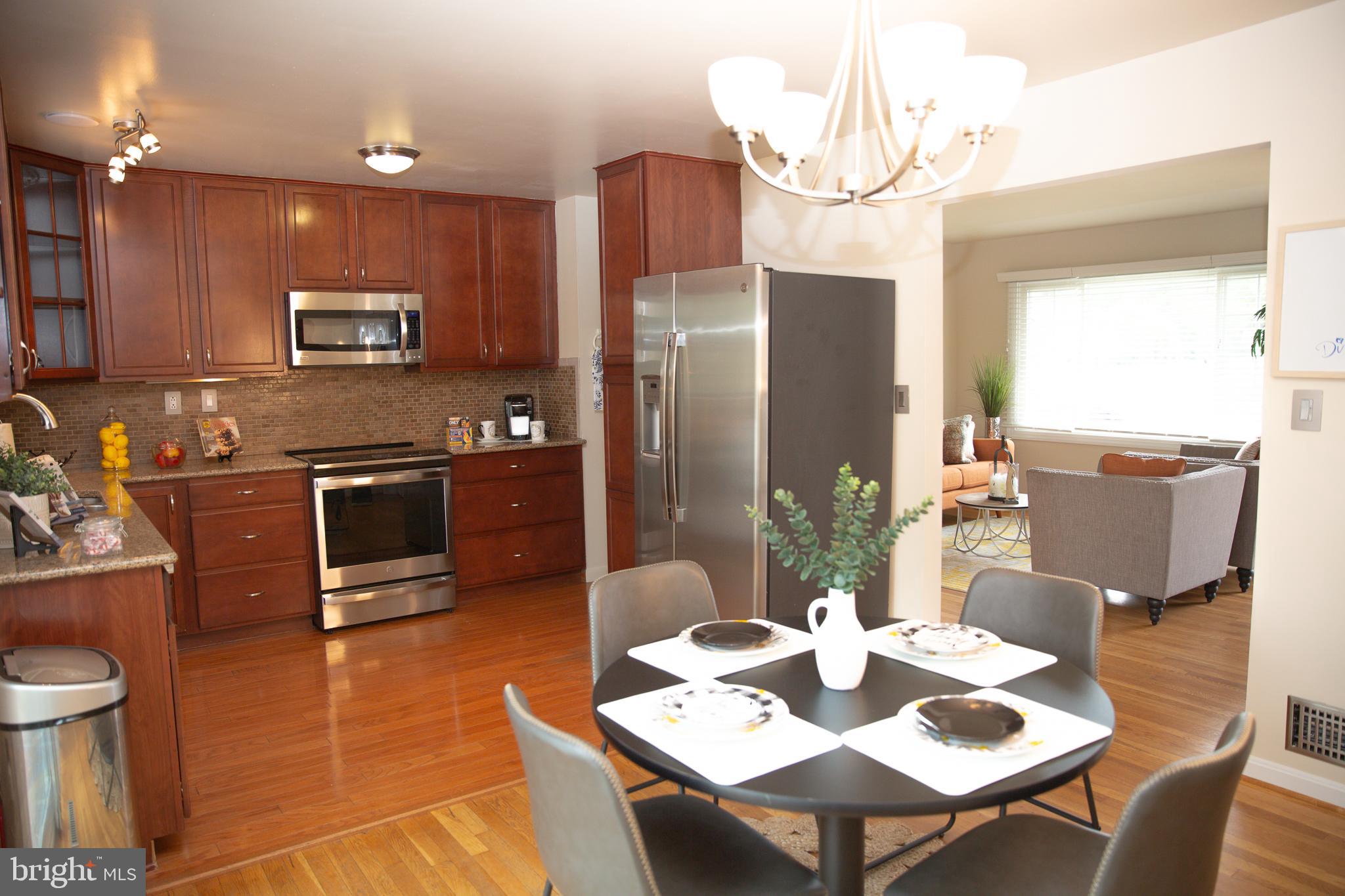 7110 Good Luck Road Hyattsville, MD 20784 - Photo 9 of 46 Dining Room and Kitchen