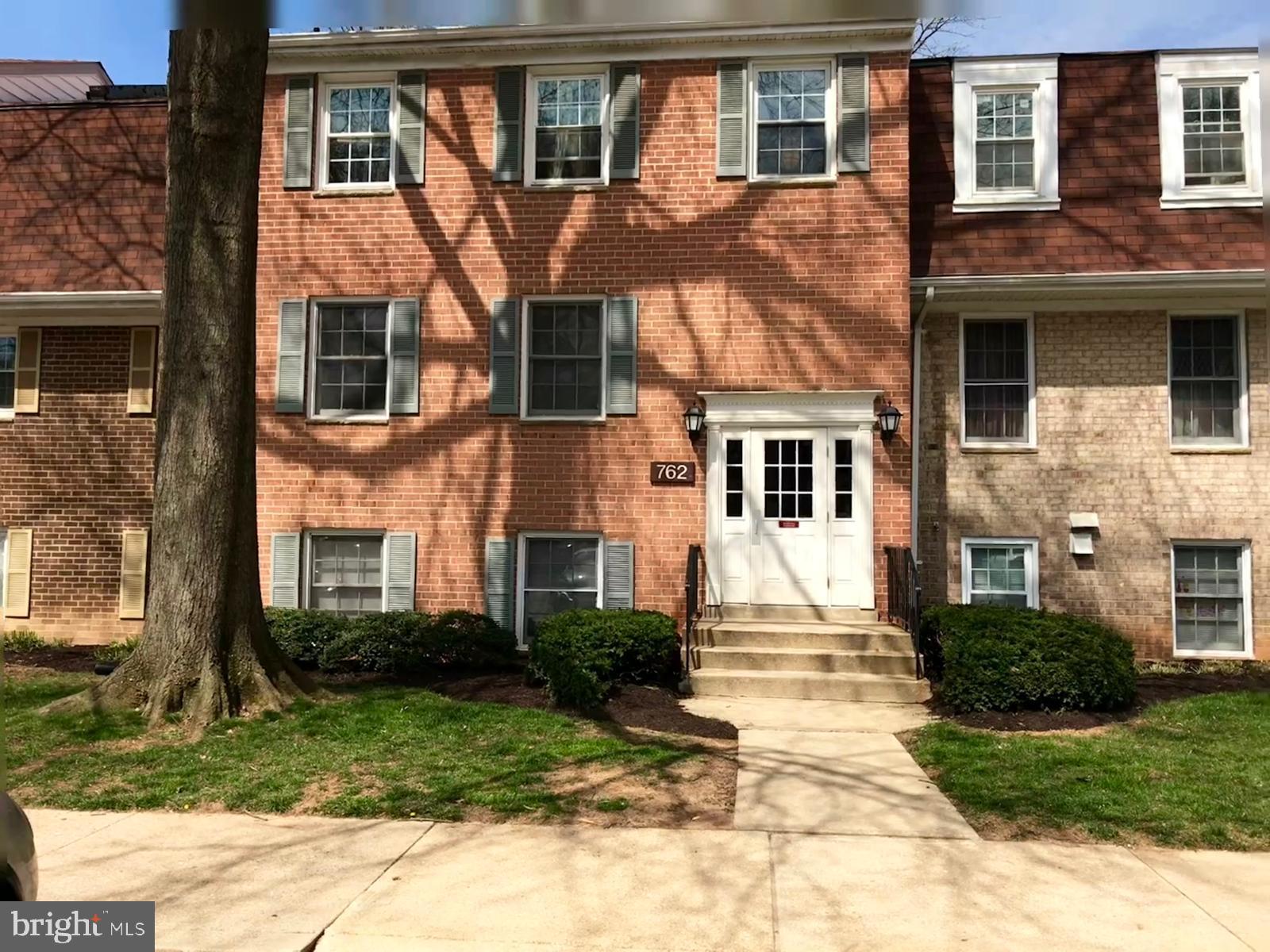 762 Quince Orchard Boulevard, Unit 101 Gaithersburg, MD 20878 - Photo 1 of 21 a front view of a house