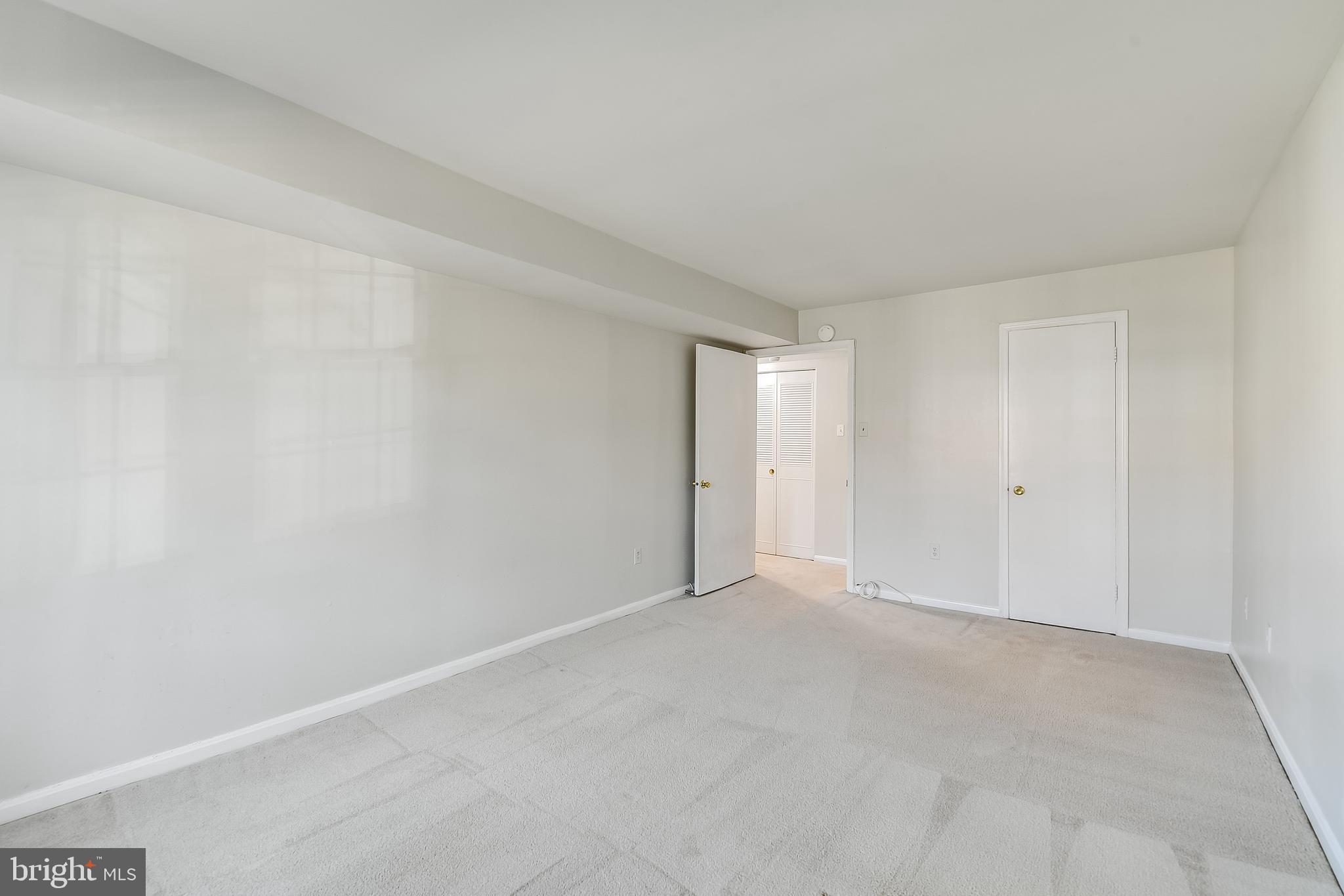 762 Quince Orchard Boulevard, Unit 101 Gaithersburg, MD 20878 - Photo 12 of 21 a view of an empty room