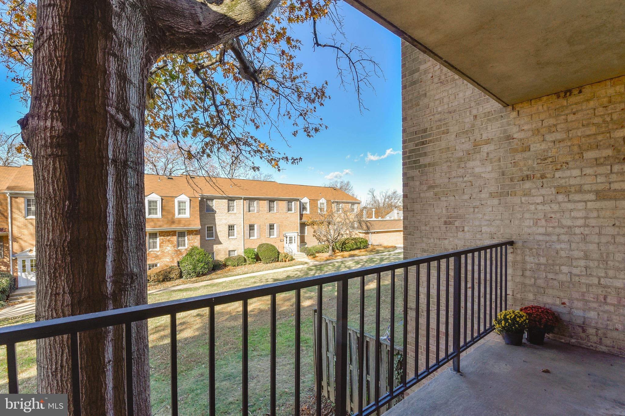 762 Quince Orchard Boulevard, Unit 101 Gaithersburg, MD 20878 - Photo 18 of 21 a view of city from a balcony