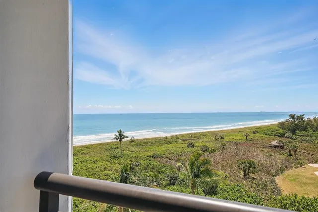 a bedroom with a bed and a night stand