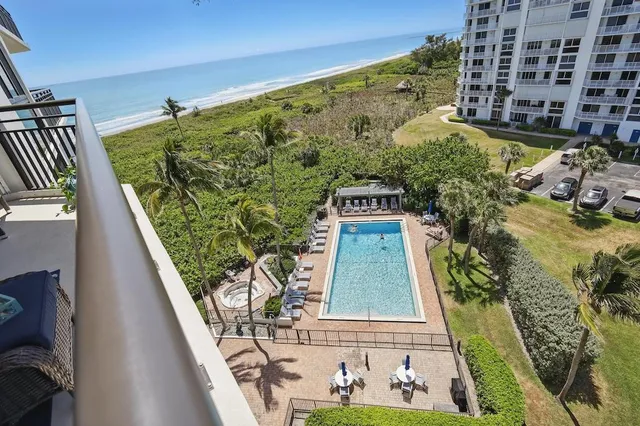 a view of a terrace with sitting area