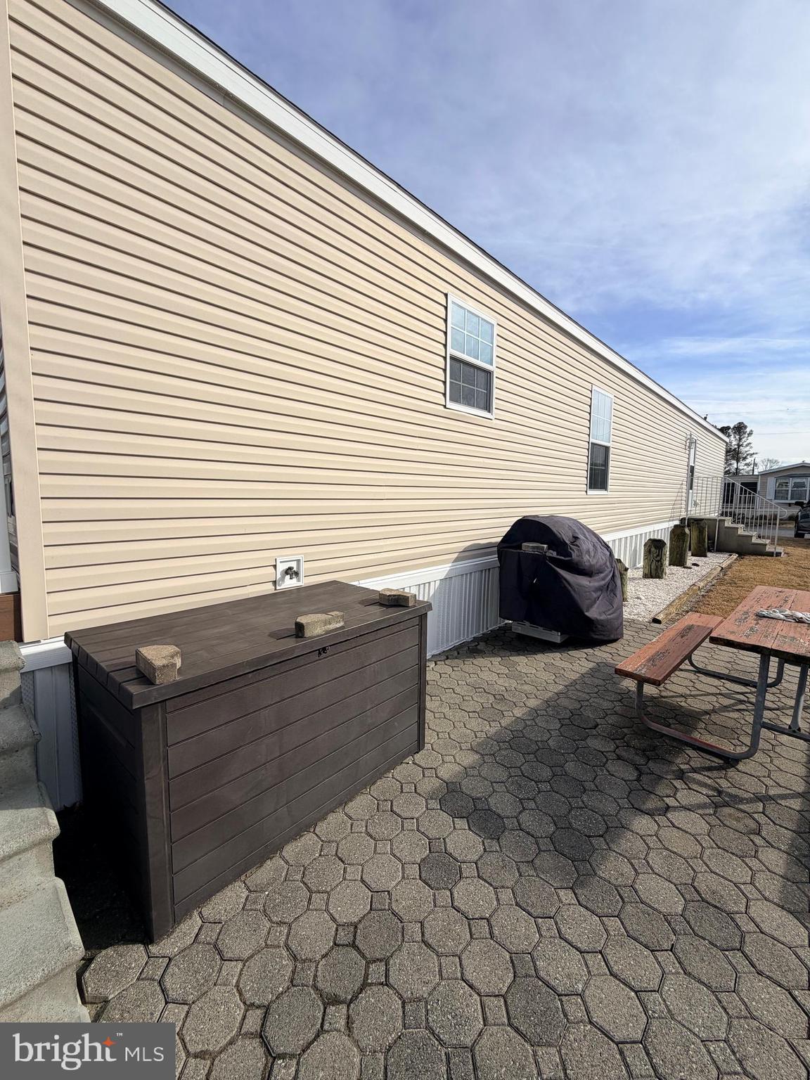 38025 Rabbit Road, Unit 101 Ocean View, DE 19970 - Photo 89 of 112 a view of a terrace with sitting area
