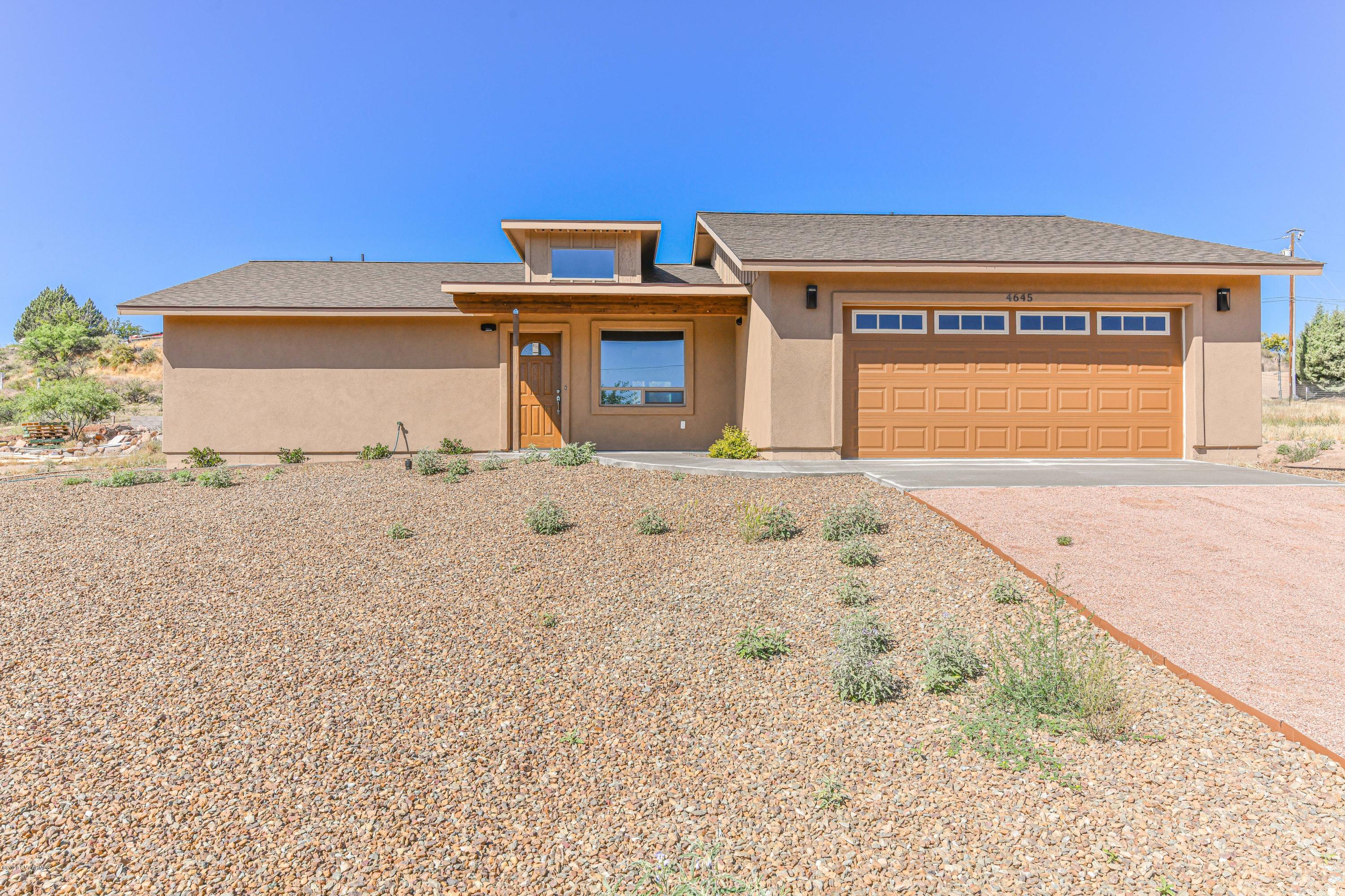 4645 East Goldmine Road Rimrock, AZ 86335 - Photo 1 of 24 a front view of a house with a yard
