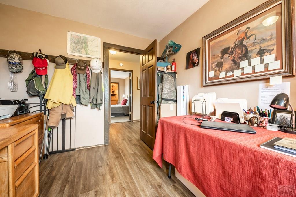 8419 3 R Road Beulah, CO 81023 - Photo 20 of 46 a view of a living room and a kitchen