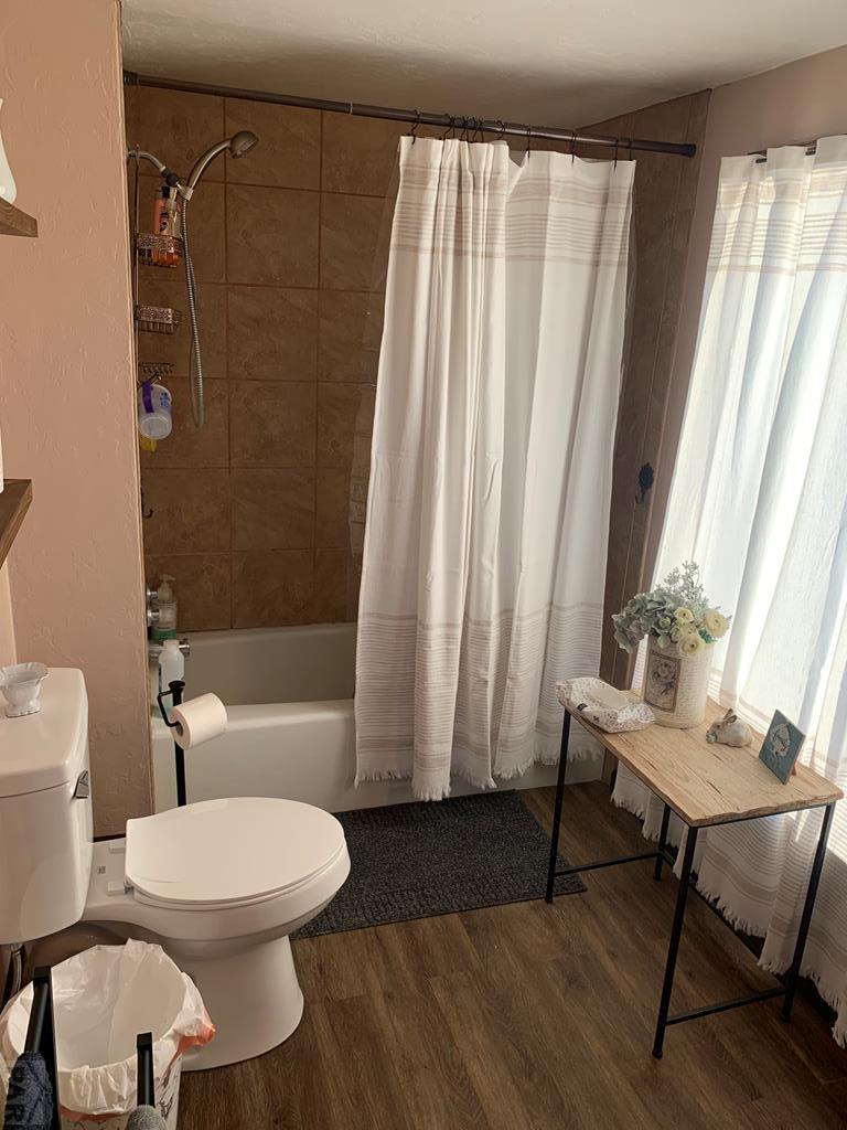 8419 3 R Road Beulah, CO 81023 - Photo 21 of 46 a bathroom with a toilet and a shower