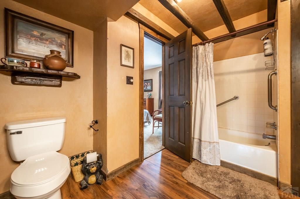 8419 3 R Road Beulah, CO 81023 - Photo 25 of 46 a bathroom with a toilet and a shower