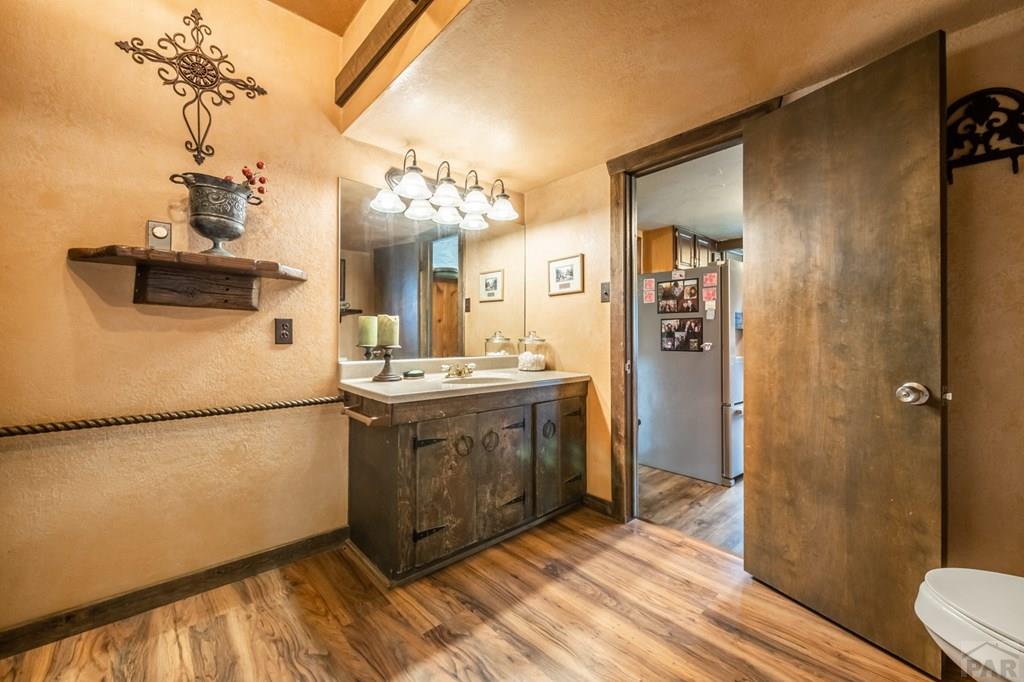 8419 3 R Road Beulah, CO 81023 - Photo 26 of 46 a bathroom with a sink a toilet and shower