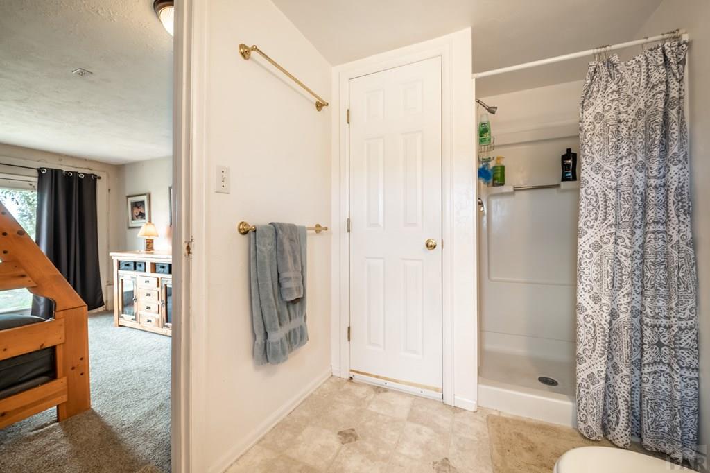 8419 3 R Road Beulah, CO 81023 - Photo 32 of 46 a bathroom with a shower and a sink