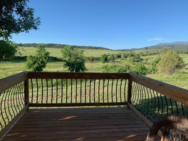 8419 3 R Road Beulah, CO 81023 - Photo 36 of 46 a view of balcony with wooden floor and fence