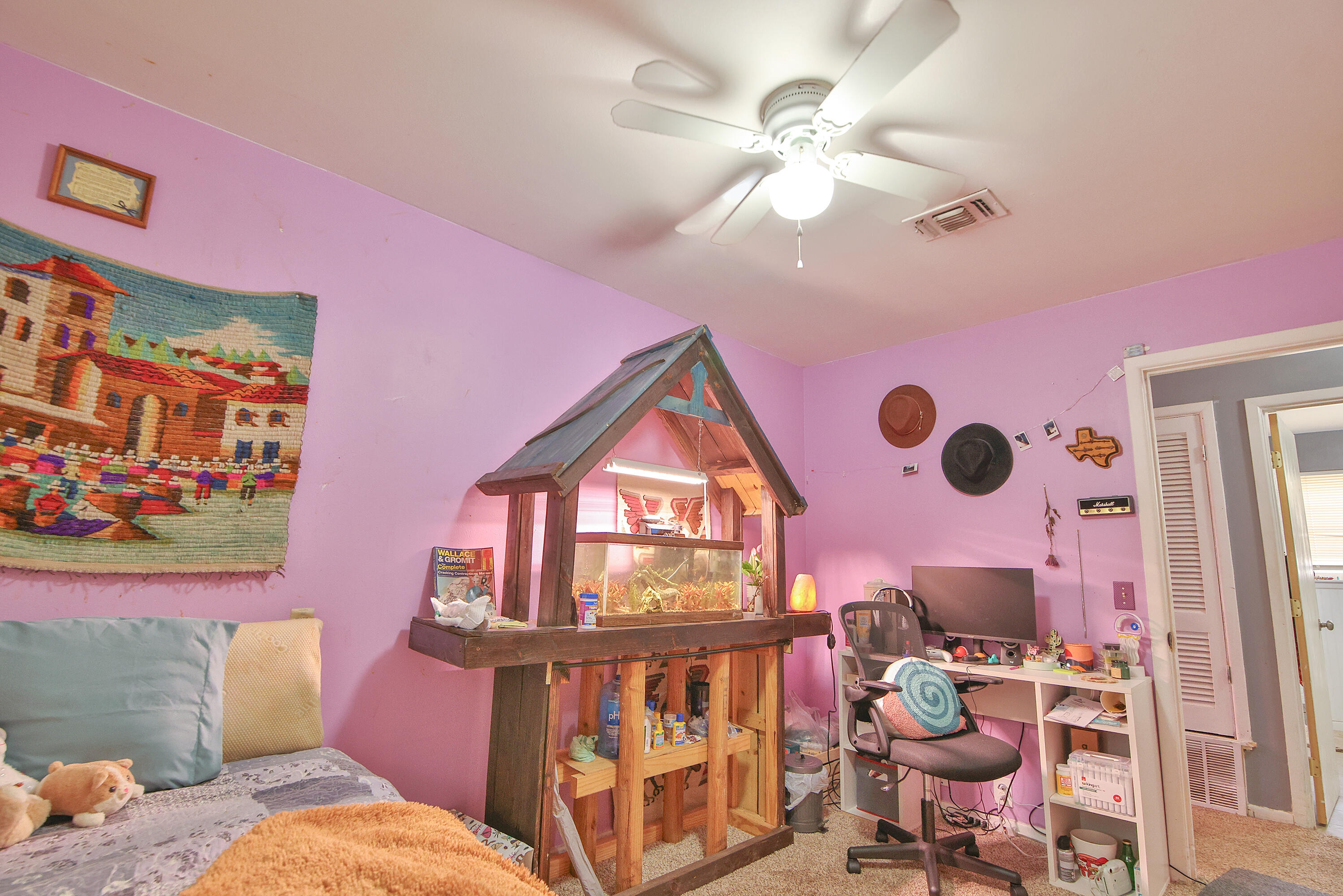 4518 49th Street Lubbock, TX 79414 - Photo 11 of 32 a living room with furniture and a window