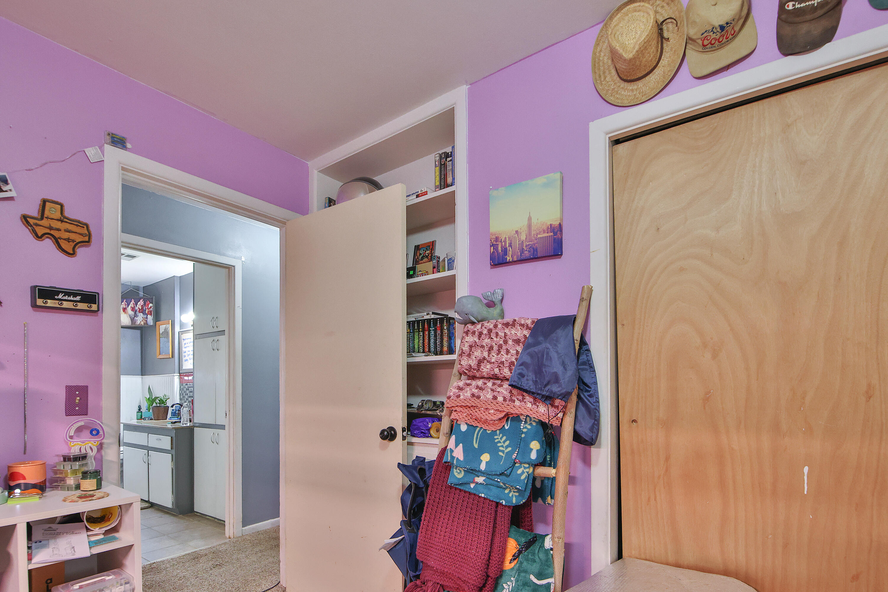 4518 49th Street Lubbock, TX 79414 - Photo 12 of 32 a potted plant sitting on a kitchen table and chair
