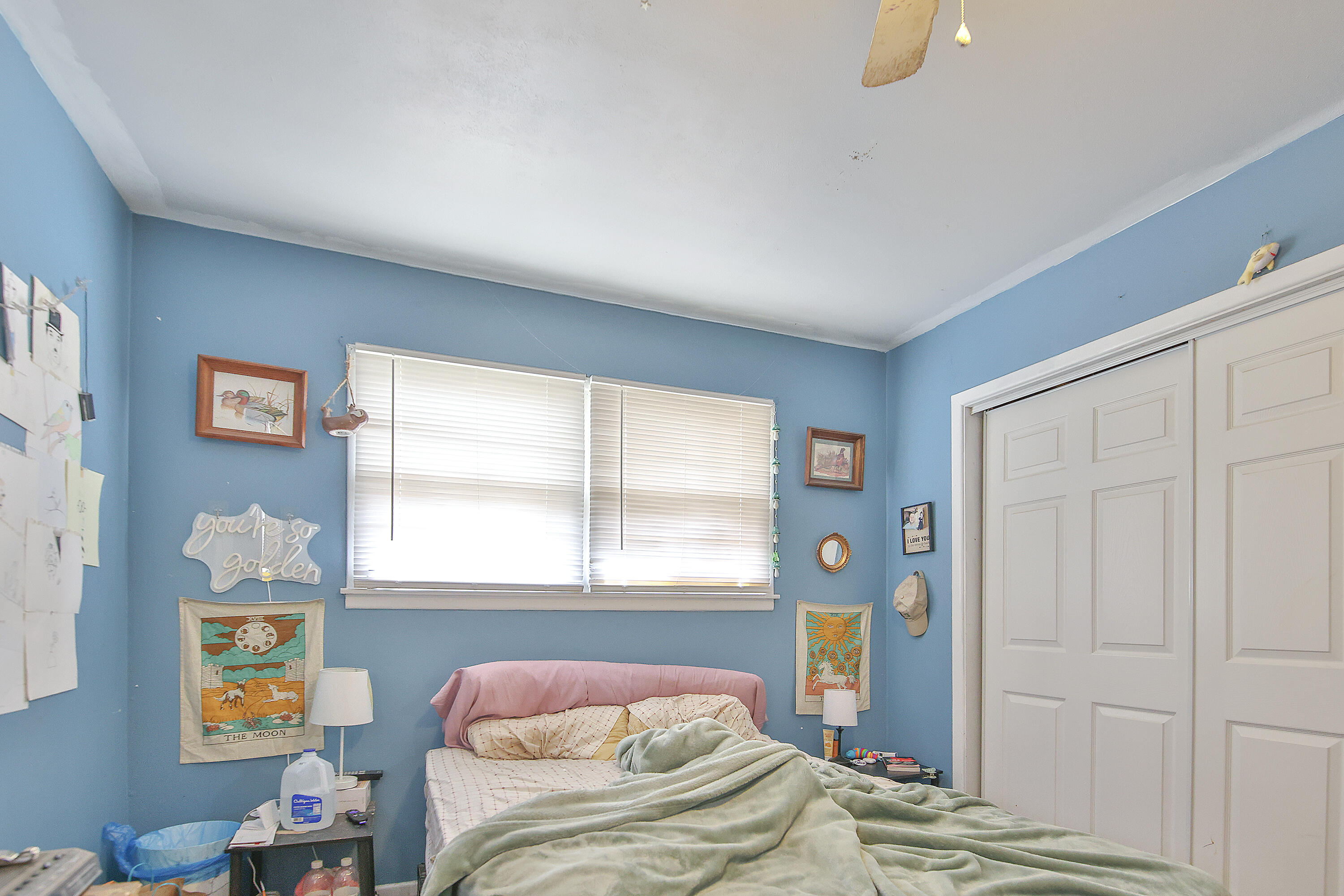 4518 49th Street Lubbock, TX 79414 - Photo 20 of 32 a bedroom with a bed and a window