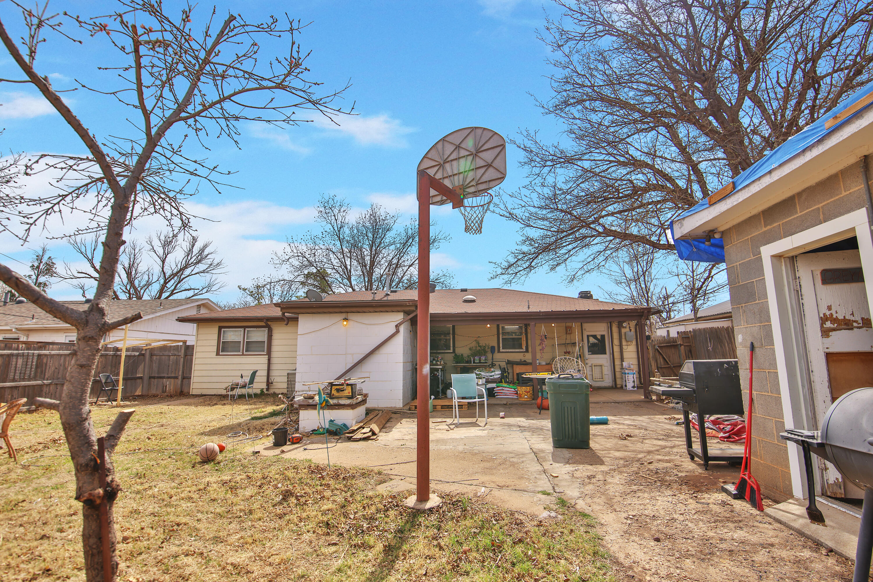 4518 49th Street Lubbock, TX 79414 - Photo 30 of 32 a front view of a house with garden