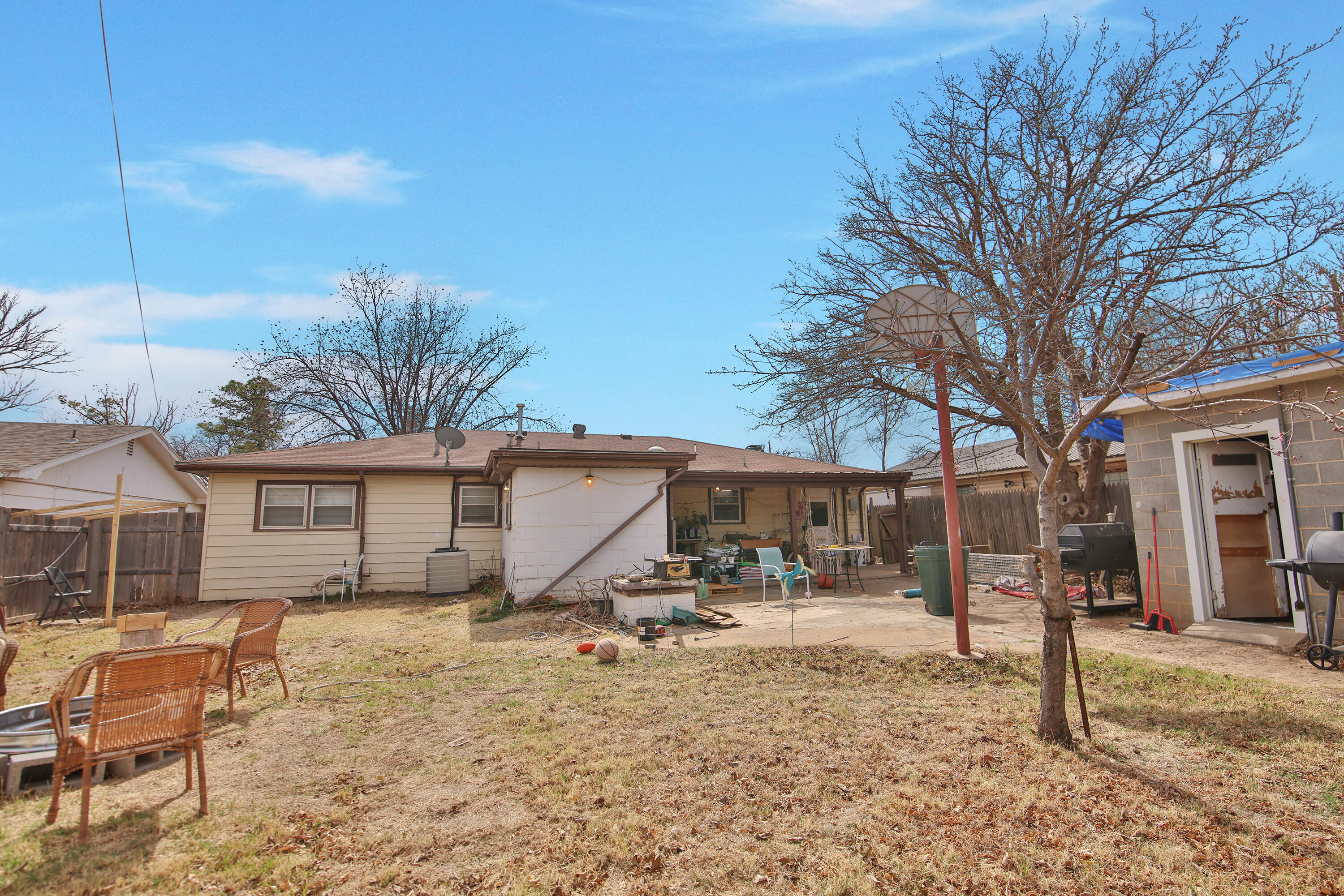 4518 49th Street Lubbock, TX 79414 - Photo 31 of 32 a view of a backyard with a patio