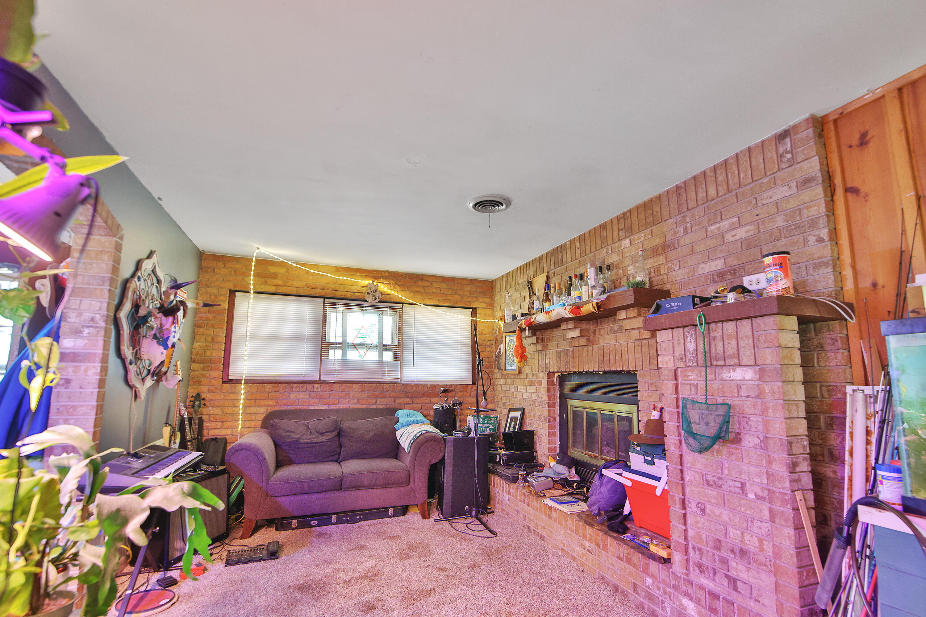 4518 49th Street Lubbock, TX 79414 - Photo 5 of 32 a living room with furniture and a couch