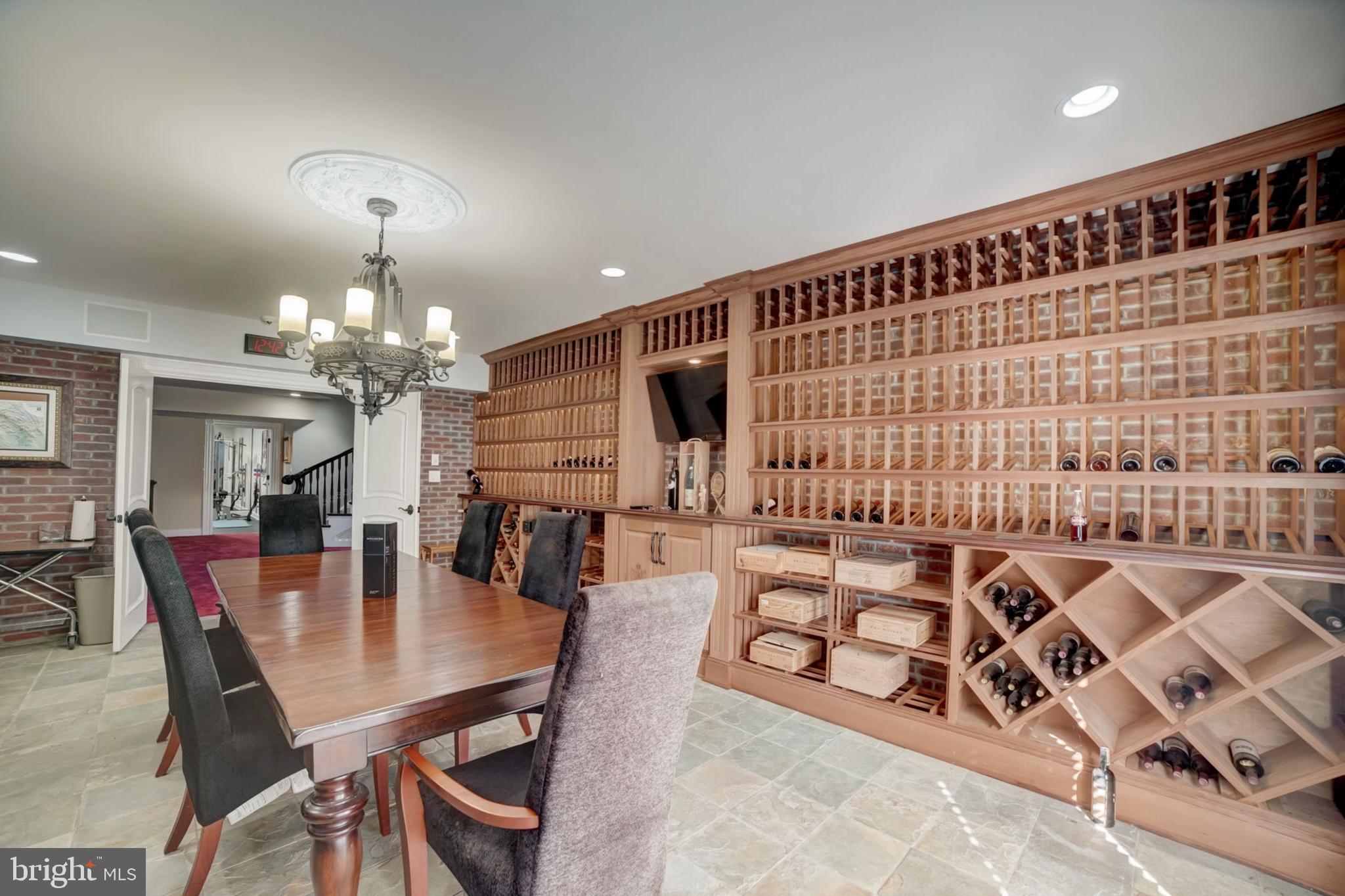 11561 Stuart Mill Road Oakton, VA 22124 - Photo 57 of 75 a view of a dining room with furniture
