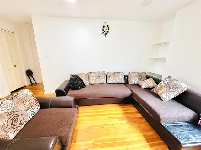 a living room with furniture and a couch