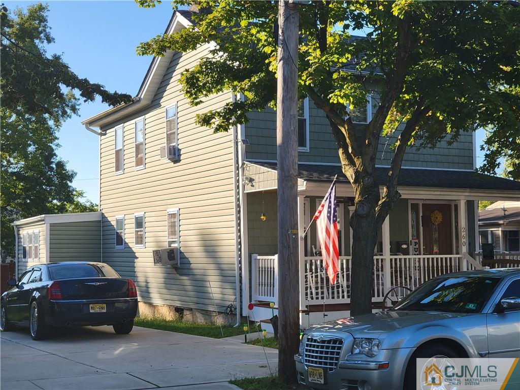 260 Raritan Street South Amboy, NJ 08879 - Photo 2 of 10 a front view of a house with parking