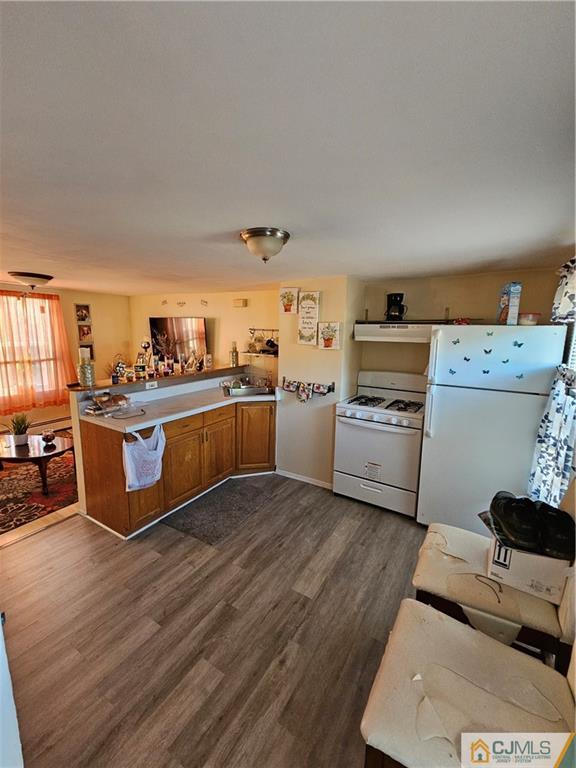 260 Raritan Street South Amboy, NJ 08879 - Photo 4 of 10 a kitchen with cabinets a sink and appliances