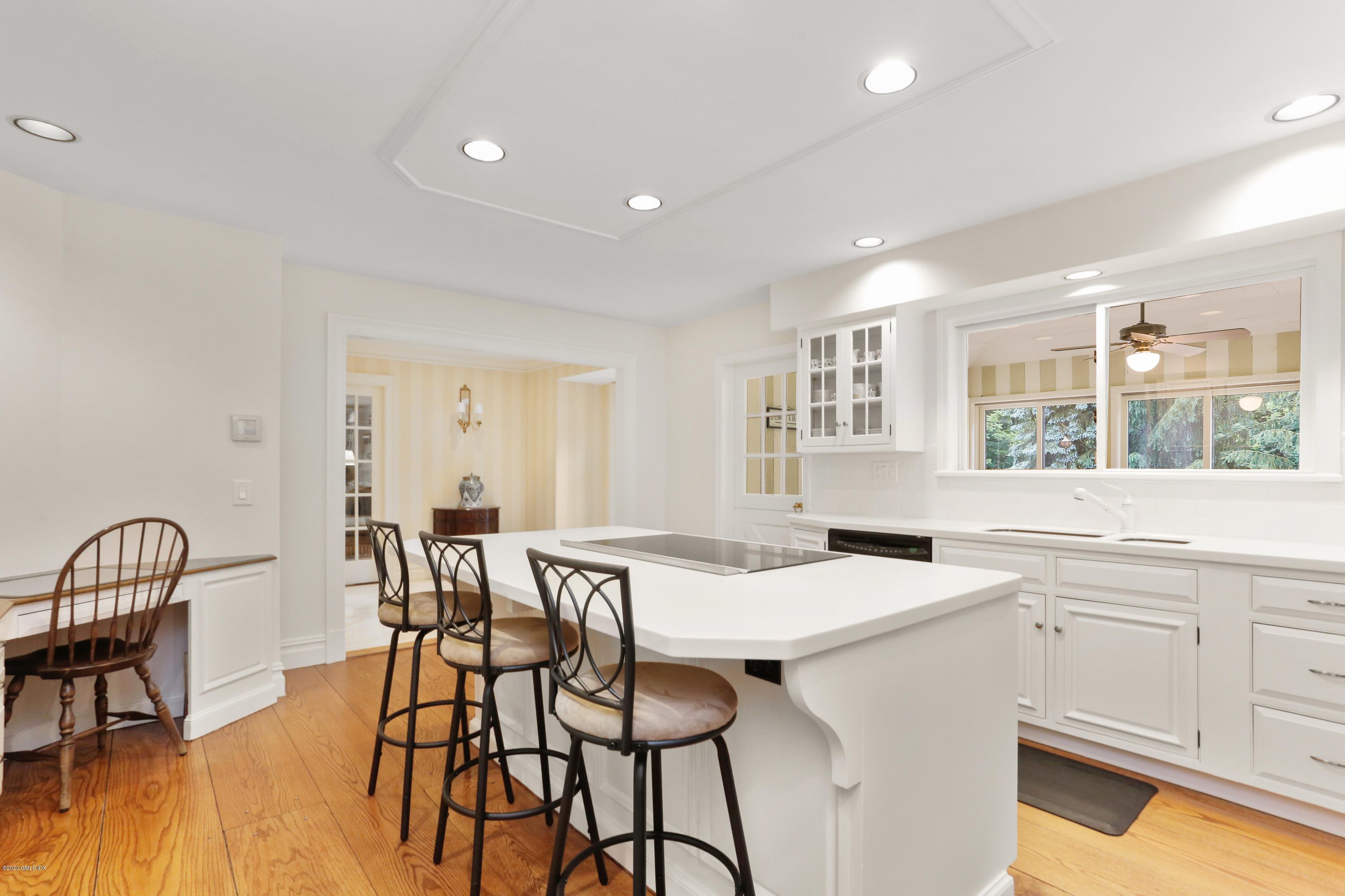 65 Ridgeview Avenue Greenwich, CT 06830 - Photo 13 of 50 a view of a dining room with furniture and wooden floor