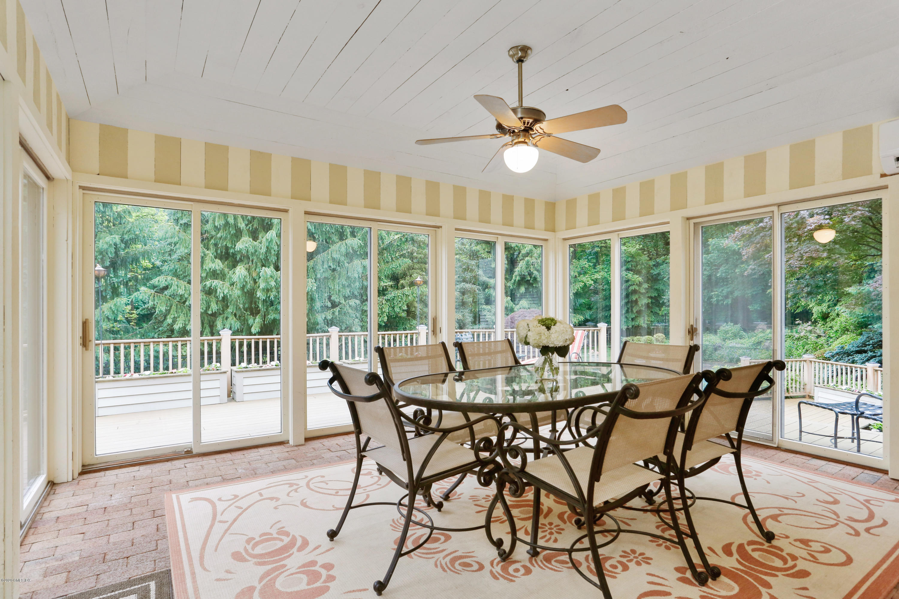 65 Ridgeview Avenue Greenwich, CT 06830 - Photo 14 of 50 a view of a dining room with furniture window and outside view