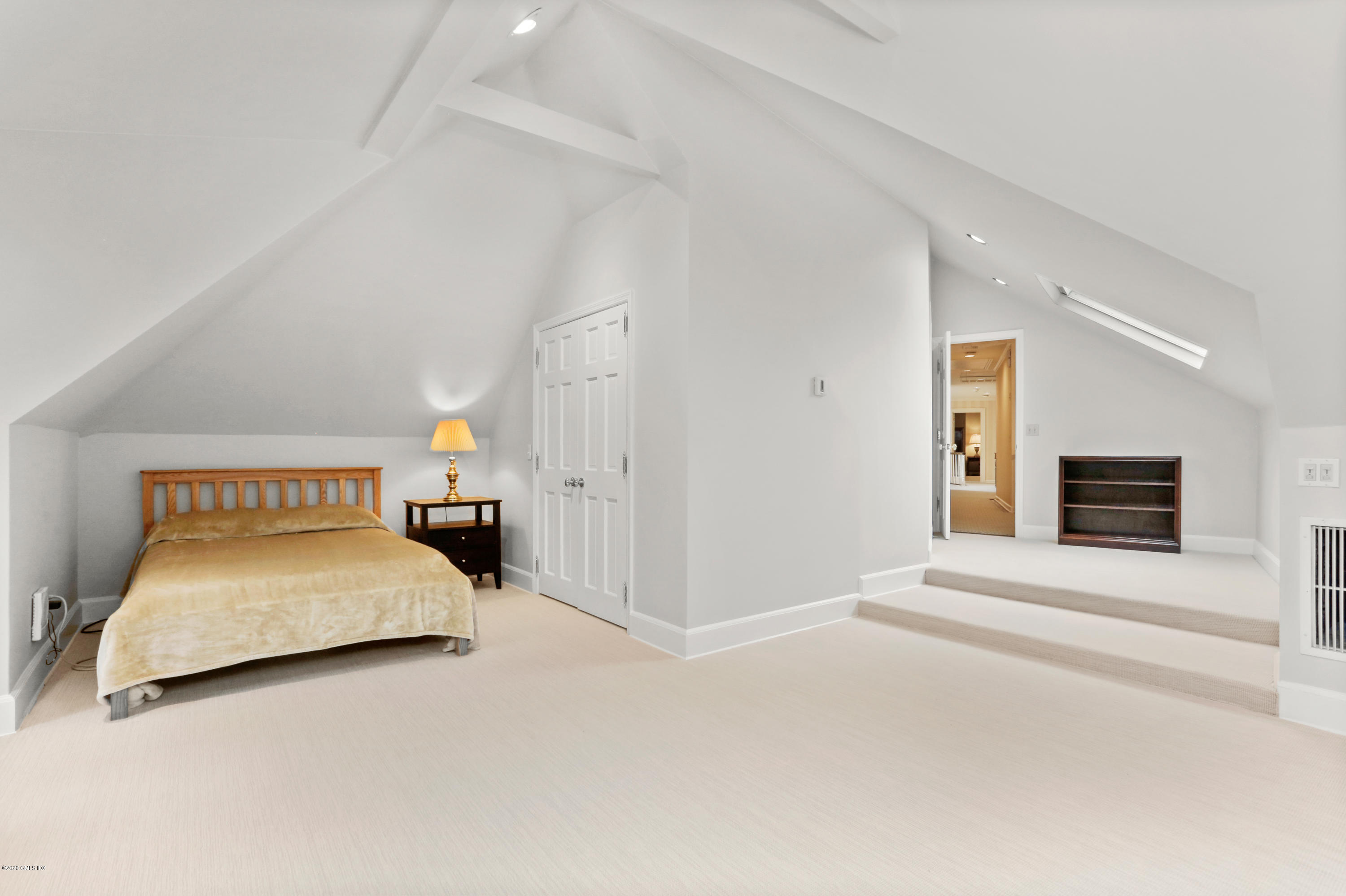 65 Ridgeview Avenue Greenwich, CT 06830 - Photo 26 of 50 a bedroom with a bed and a window