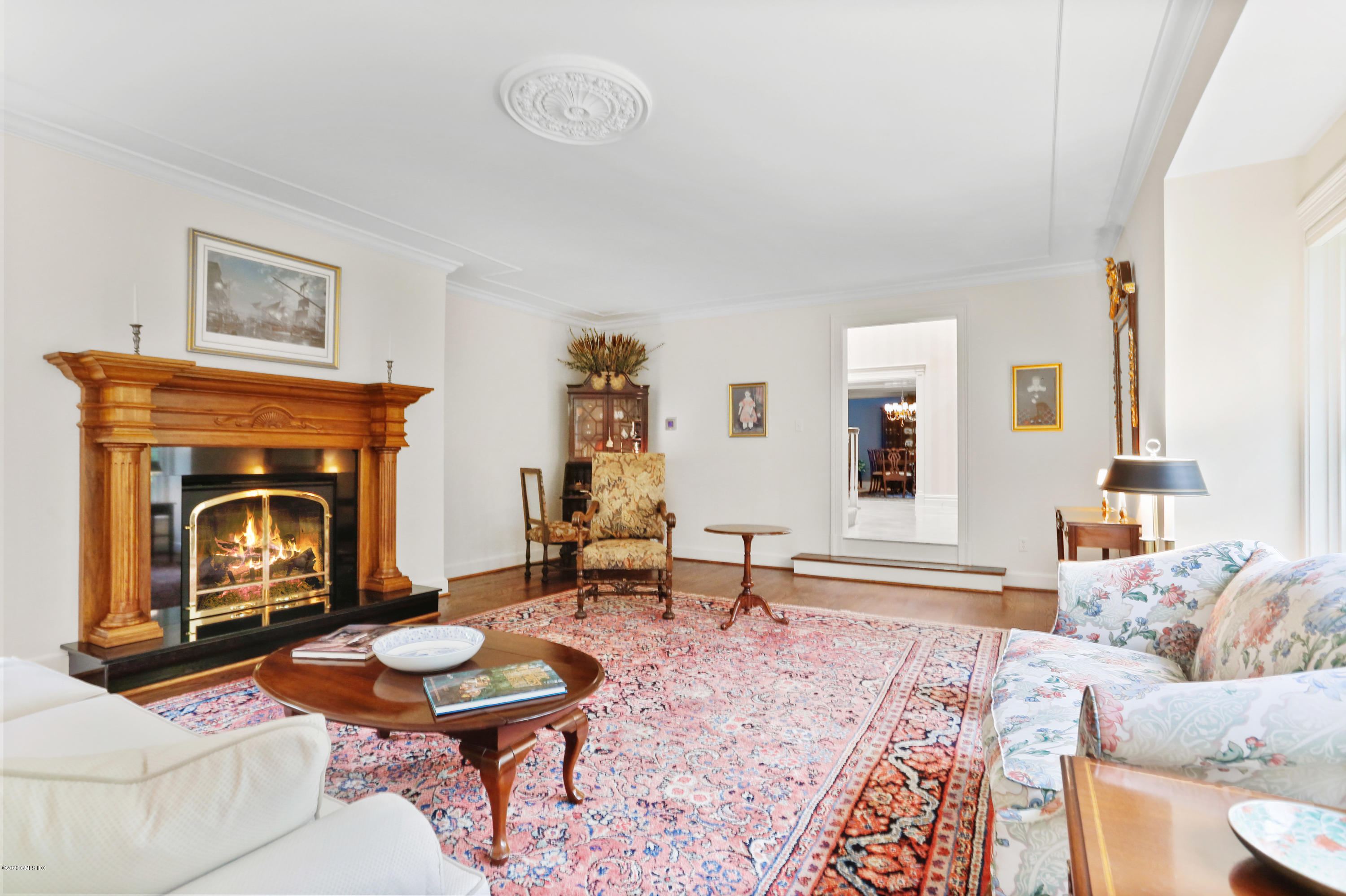 65 Ridgeview Avenue Greenwich, CT 06830 - Photo 7 of 50 a living room with furniture and a fireplace
