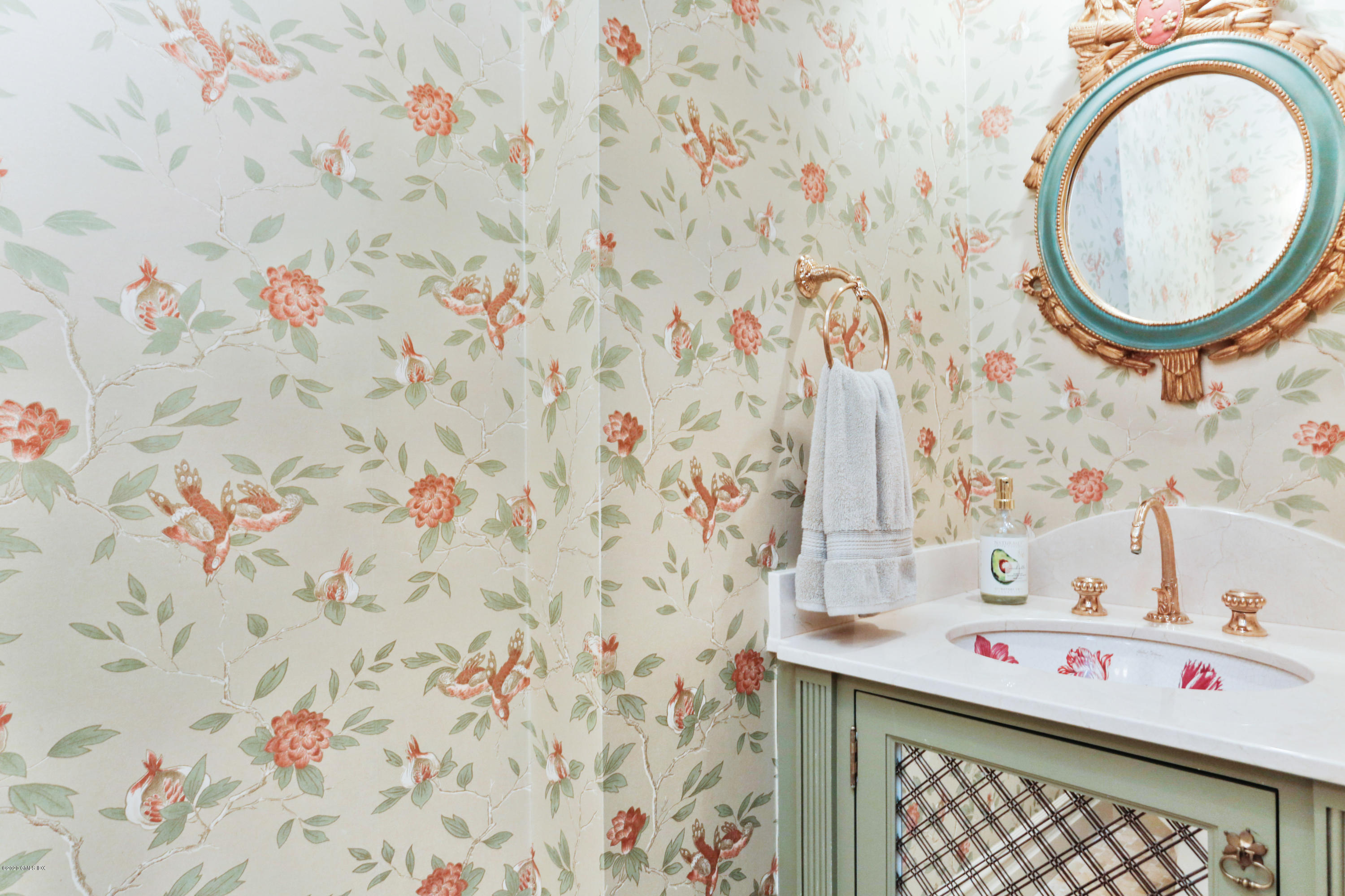 65 Ridgeview Avenue Greenwich, CT 06830 - Photo 9 of 50 a bathroom with a sink and a mirror