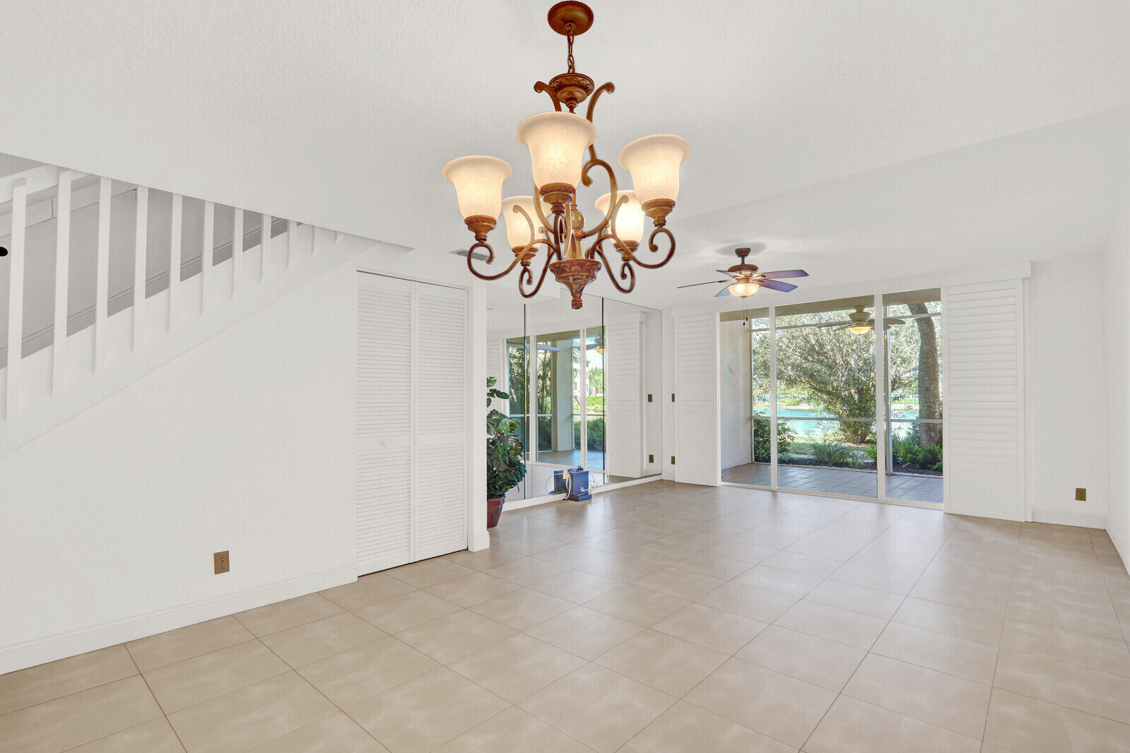 353 Highway 1, Unit D105 Jupiter, FL 33477 - Photo 14 of 56 a view of a chandelier in a room