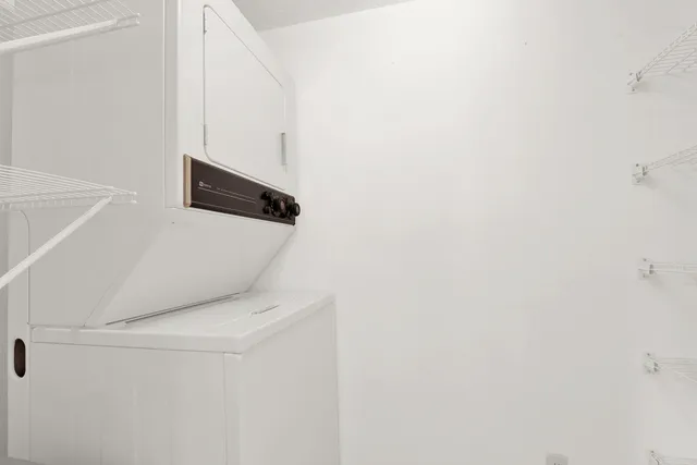 a view of a hallway with staircase