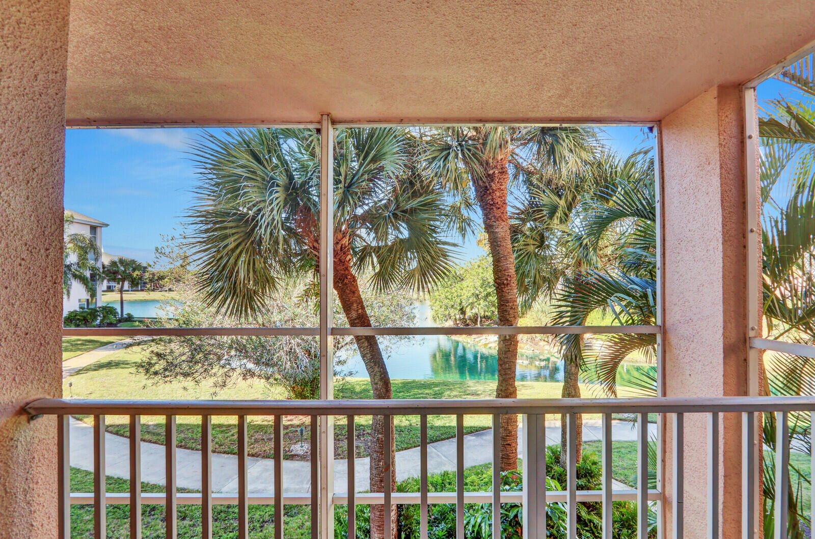 353 Highway 1, Unit D105 Jupiter, FL 33477 - Photo 22 of 56 a view of a garden from a window