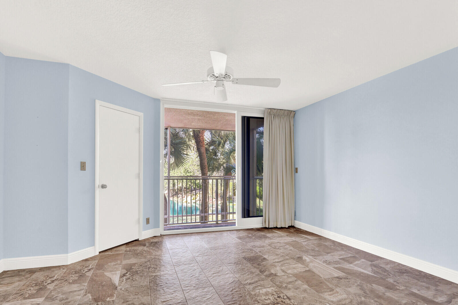 353 Highway 1, Unit D105 Jupiter, FL 33477 - Photo 24 of 56 a view of an empty room with a window
