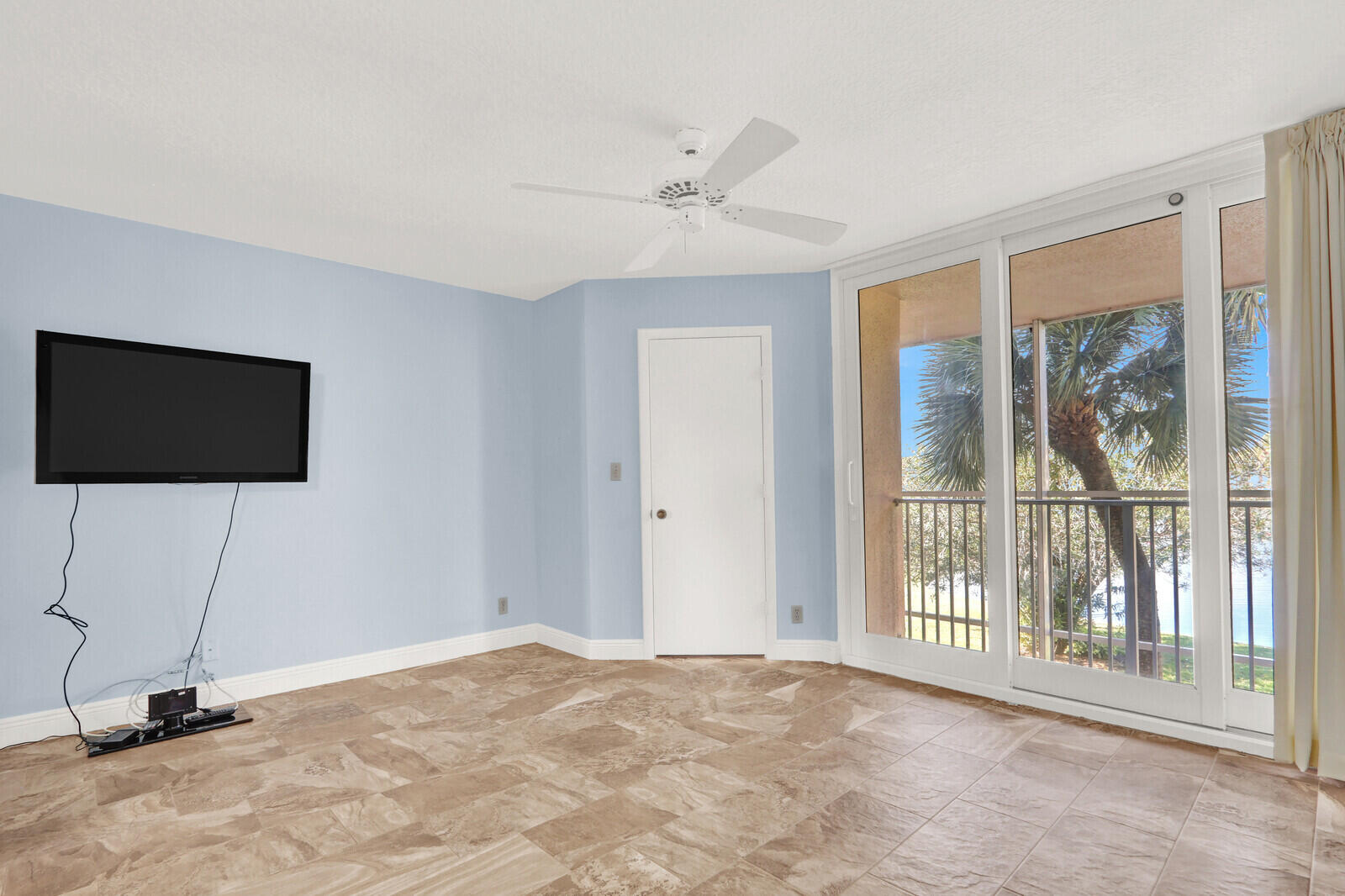 353 Highway 1, Unit D105 Jupiter, FL 33477 - Photo 27 of 56 a view of a livingroom with a flat screen tv