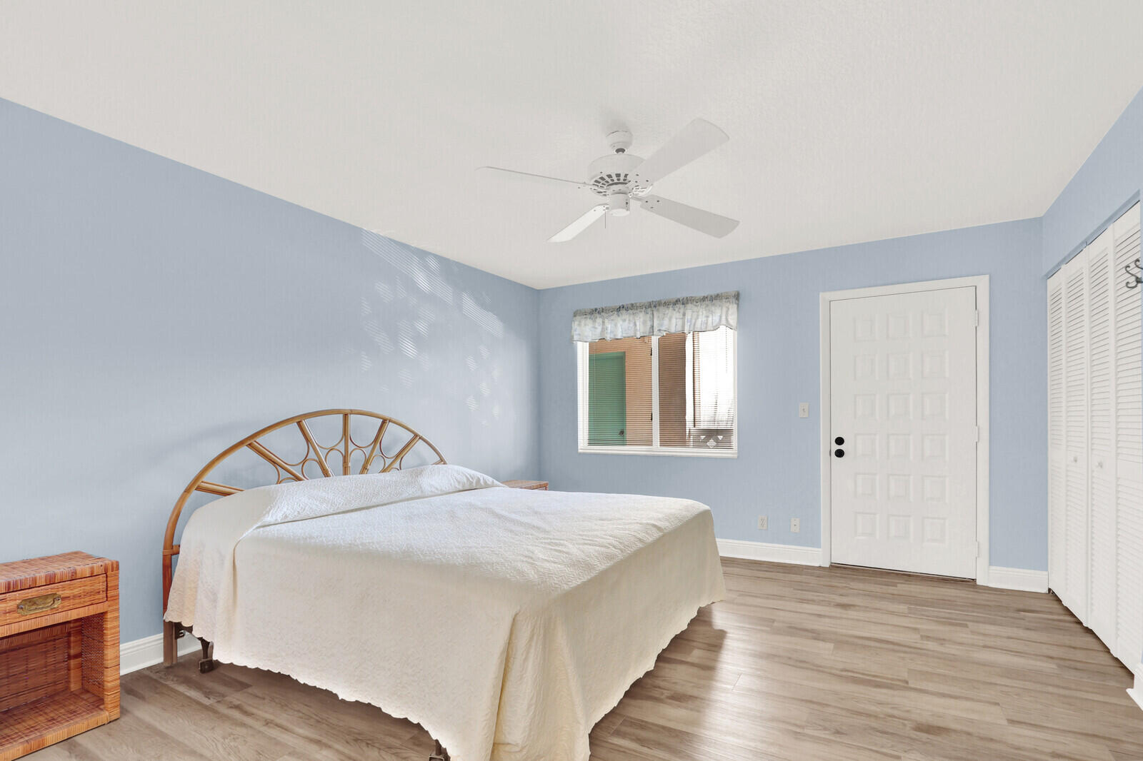 353 Highway 1, Unit D105 Jupiter, FL 33477 - Photo 32 of 56 a bedroom with a bed and a window