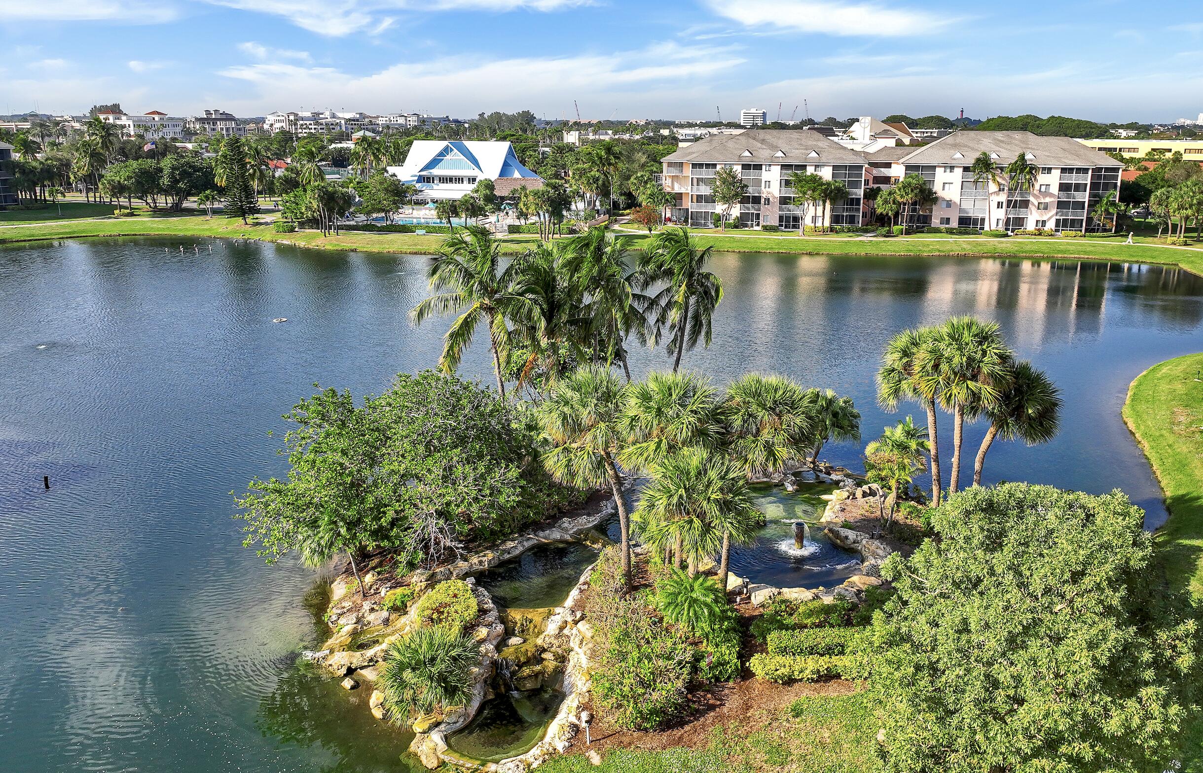 353 Highway 1, Unit D105 Jupiter, FL 33477 - Photo 41 of 56 a view of a lake with a city