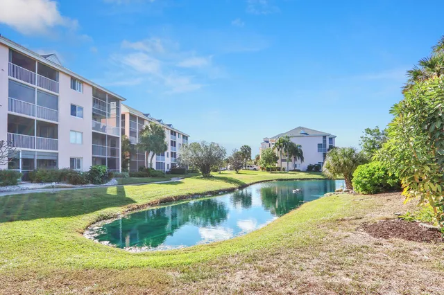 a front view of a building with garden