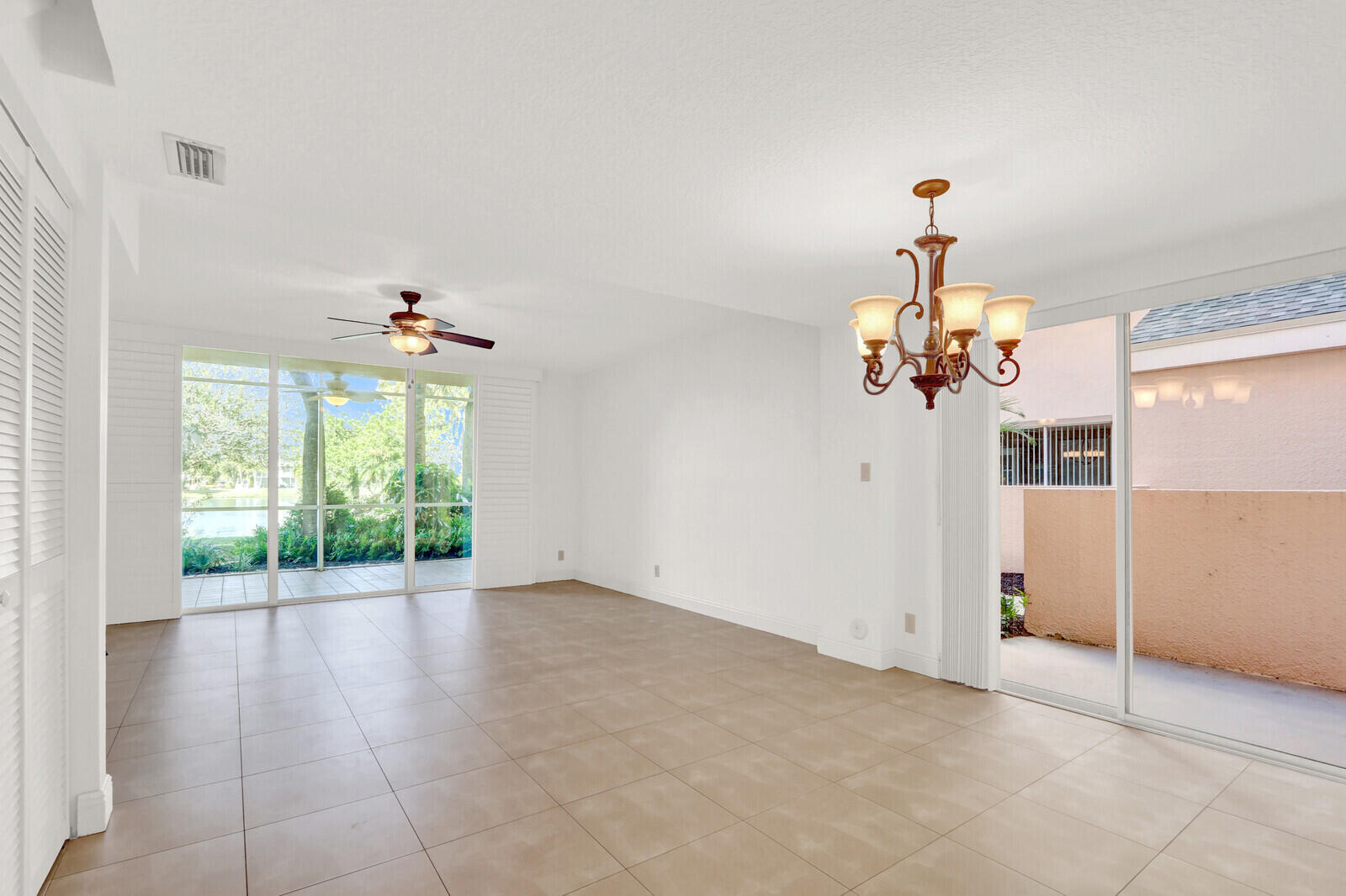 353 Highway 1, Unit D105 Jupiter, FL 33477 - Photo 5 of 56 a view of an empty room with a window