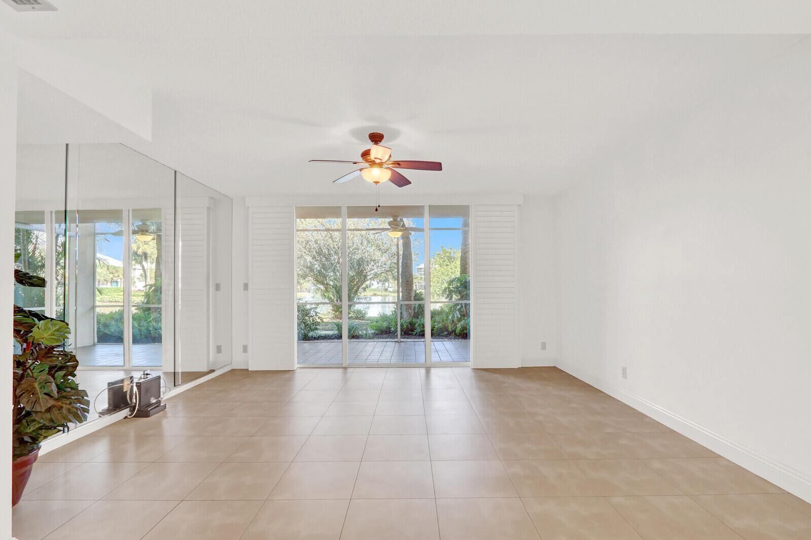 353 Highway 1, Unit D105 Jupiter, FL 33477 - Photo 6 of 56 a view of an empty room with a window
