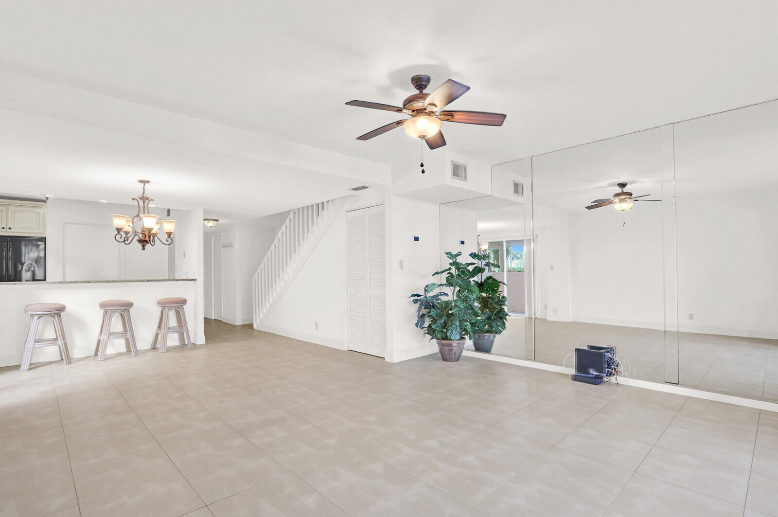 353 Highway 1, Unit D105 Jupiter, FL 33477 - Photo 8 of 56 a view of an empty room with a window