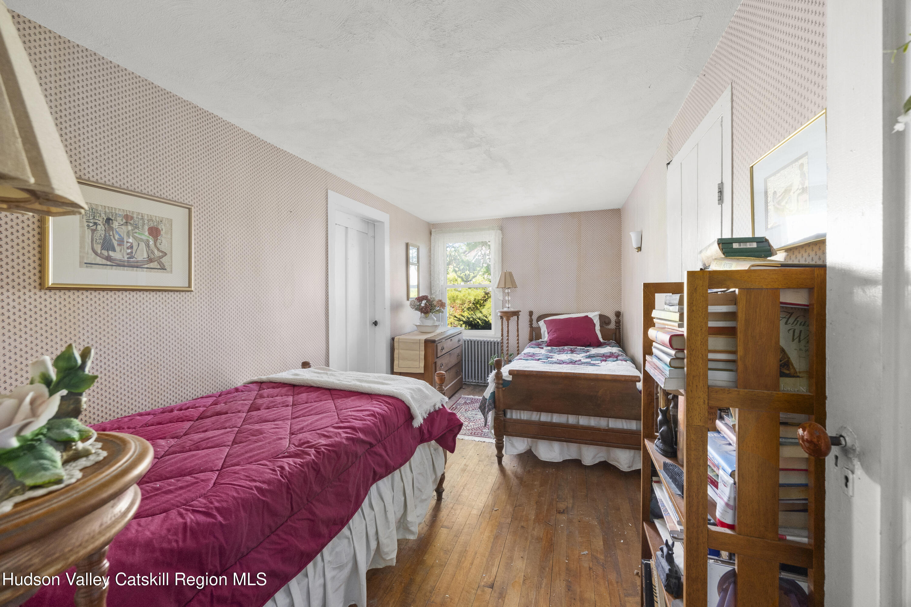 1745 County Route 7 Ancram, NY 12502 - Photo 14 of 22 a bedroom with bed and wooden floor