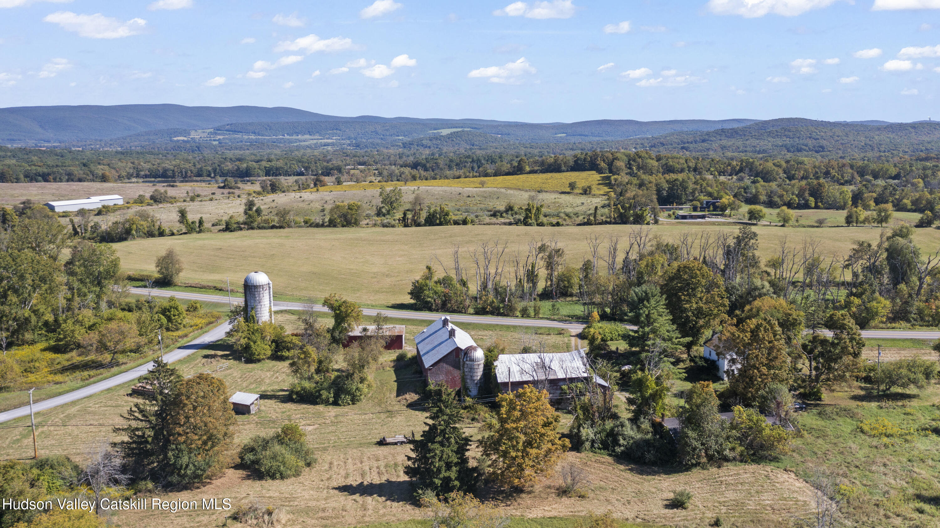 1745 County Route 7 Ancram, NY 12502 - Photo 16 of 22 a view of a lake with a mountain