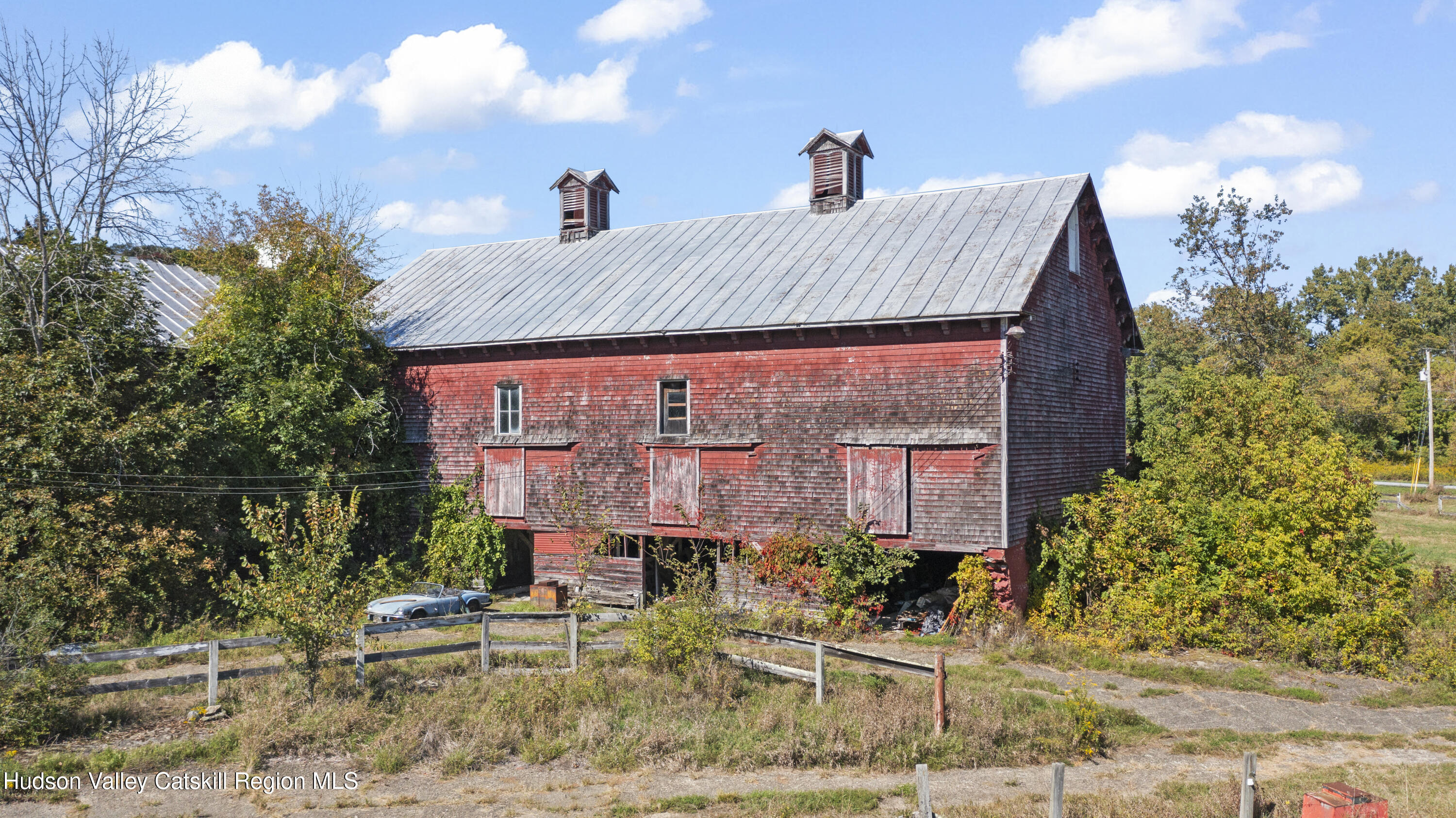 1745 County Route 7 Ancram, NY 12502 - Photo 19 of 22 a view of a house with a yard
